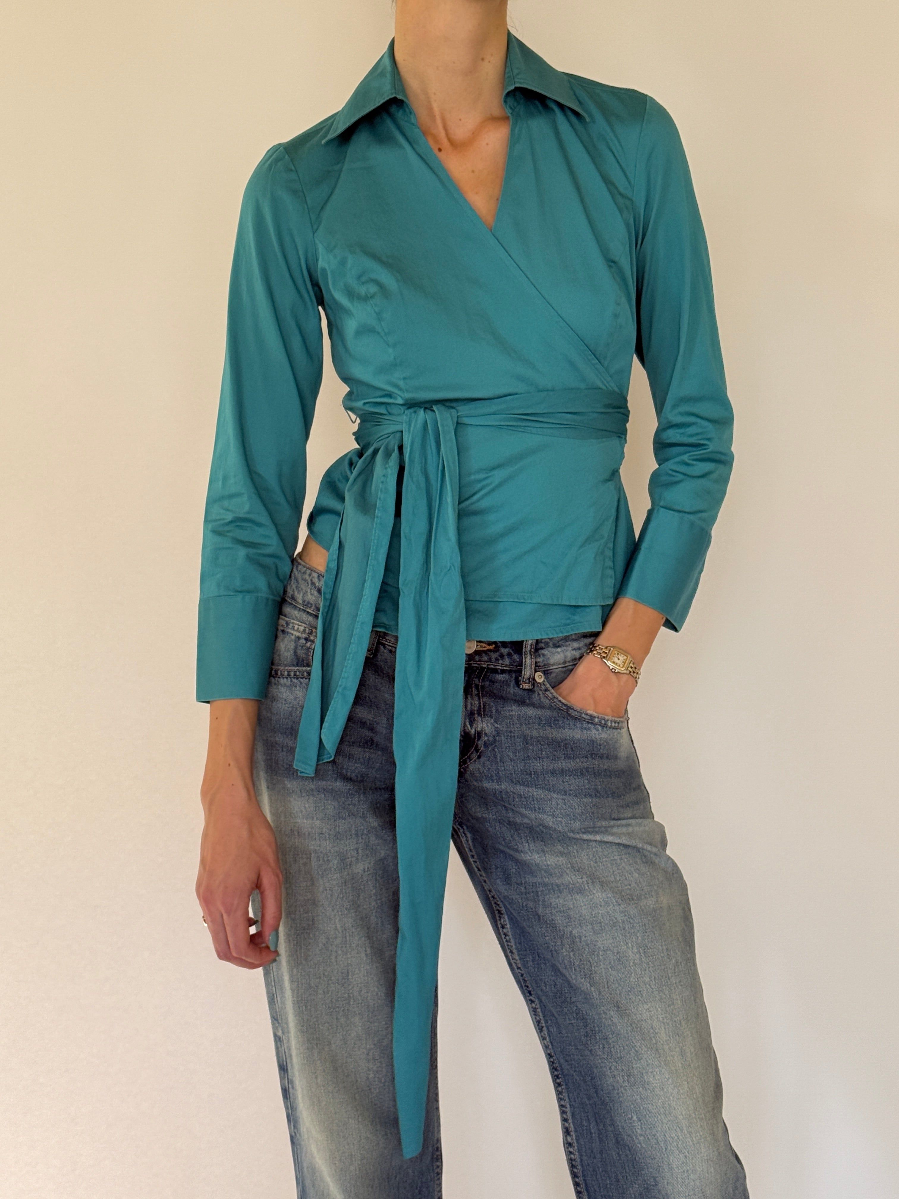Vintage fitted turquoise wrap blouse side view