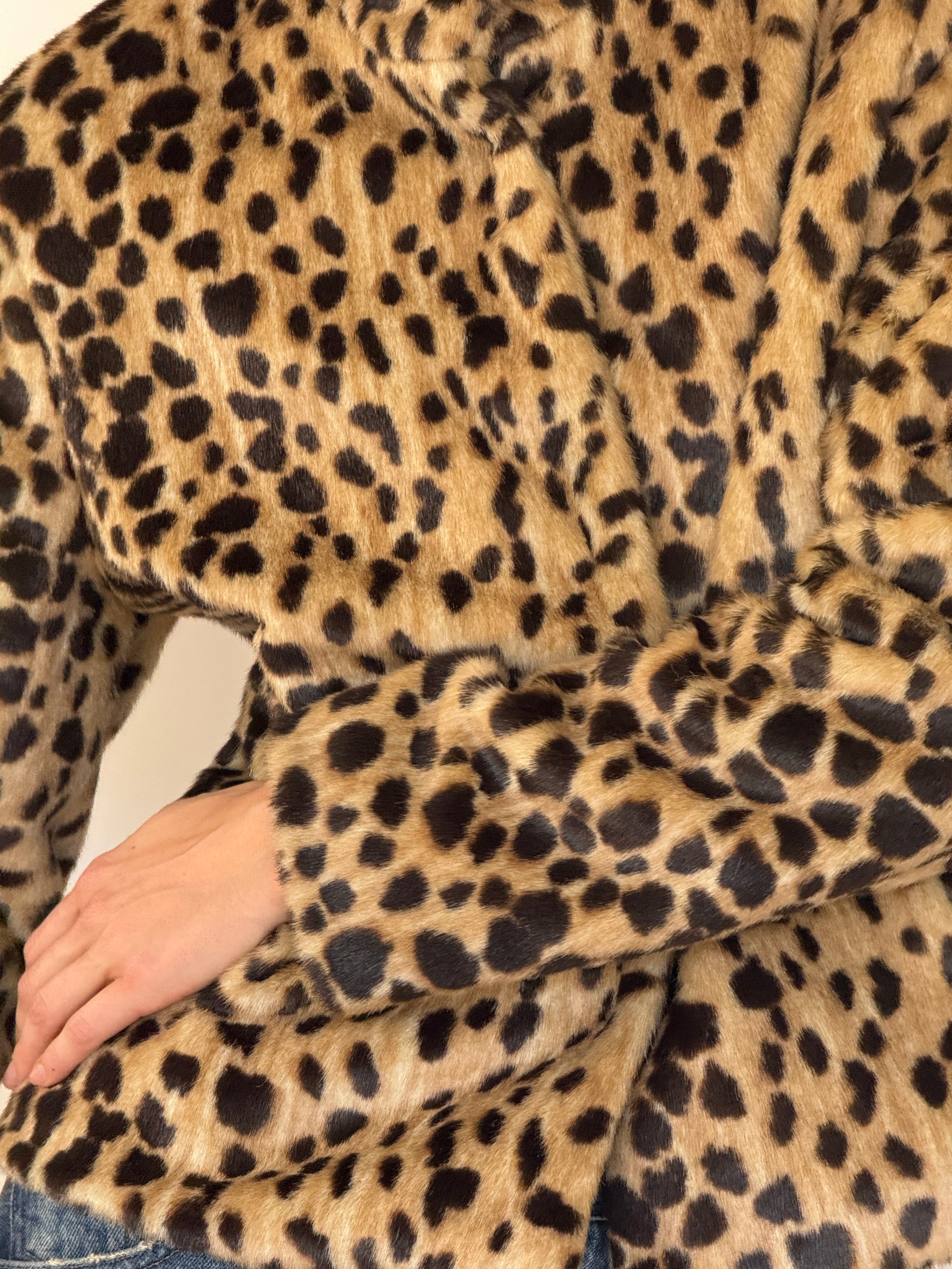 Vintage faux fur jacket leopard fabric close-up