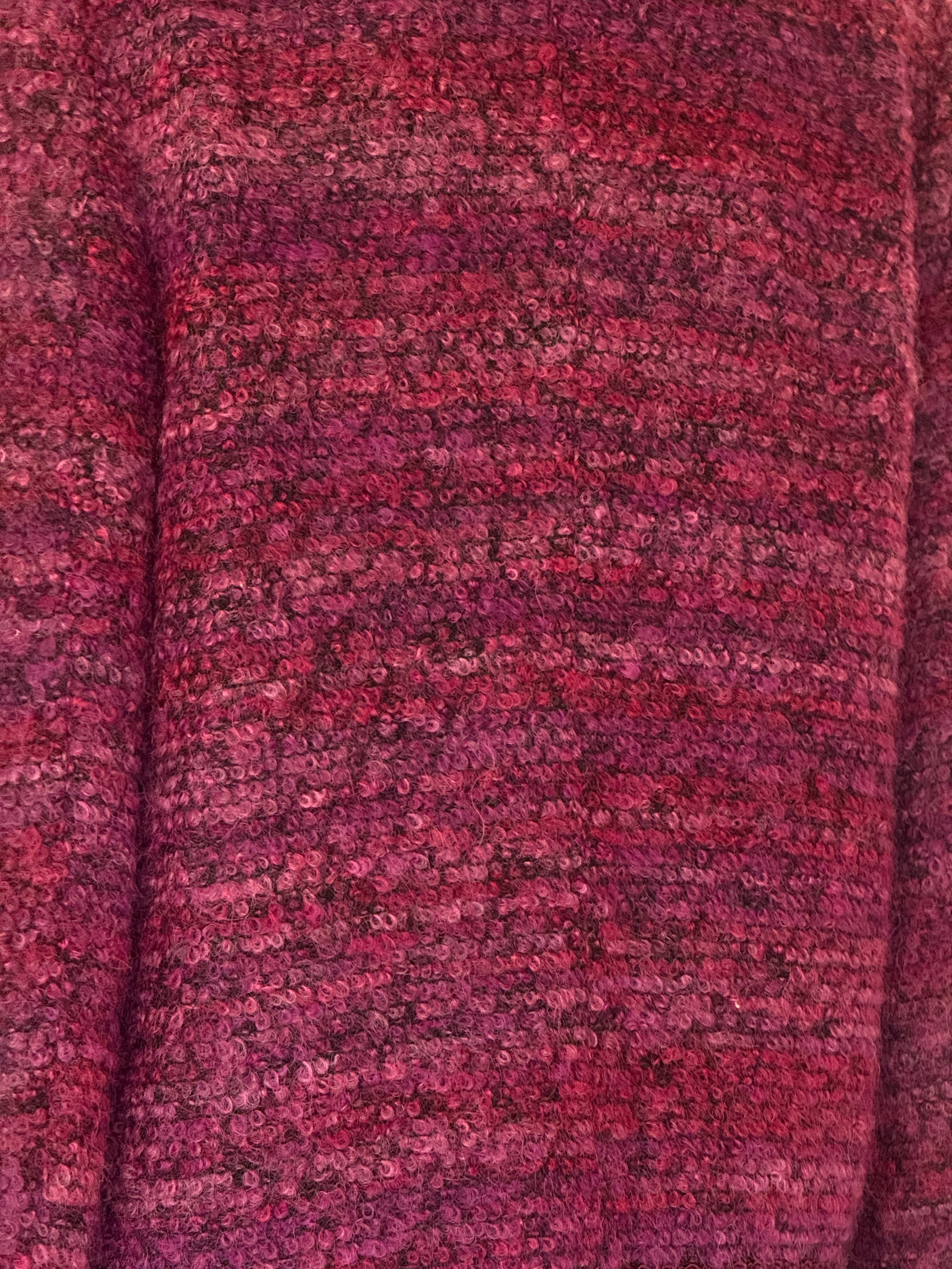 Vintage purple bouclé fabric close-up texture