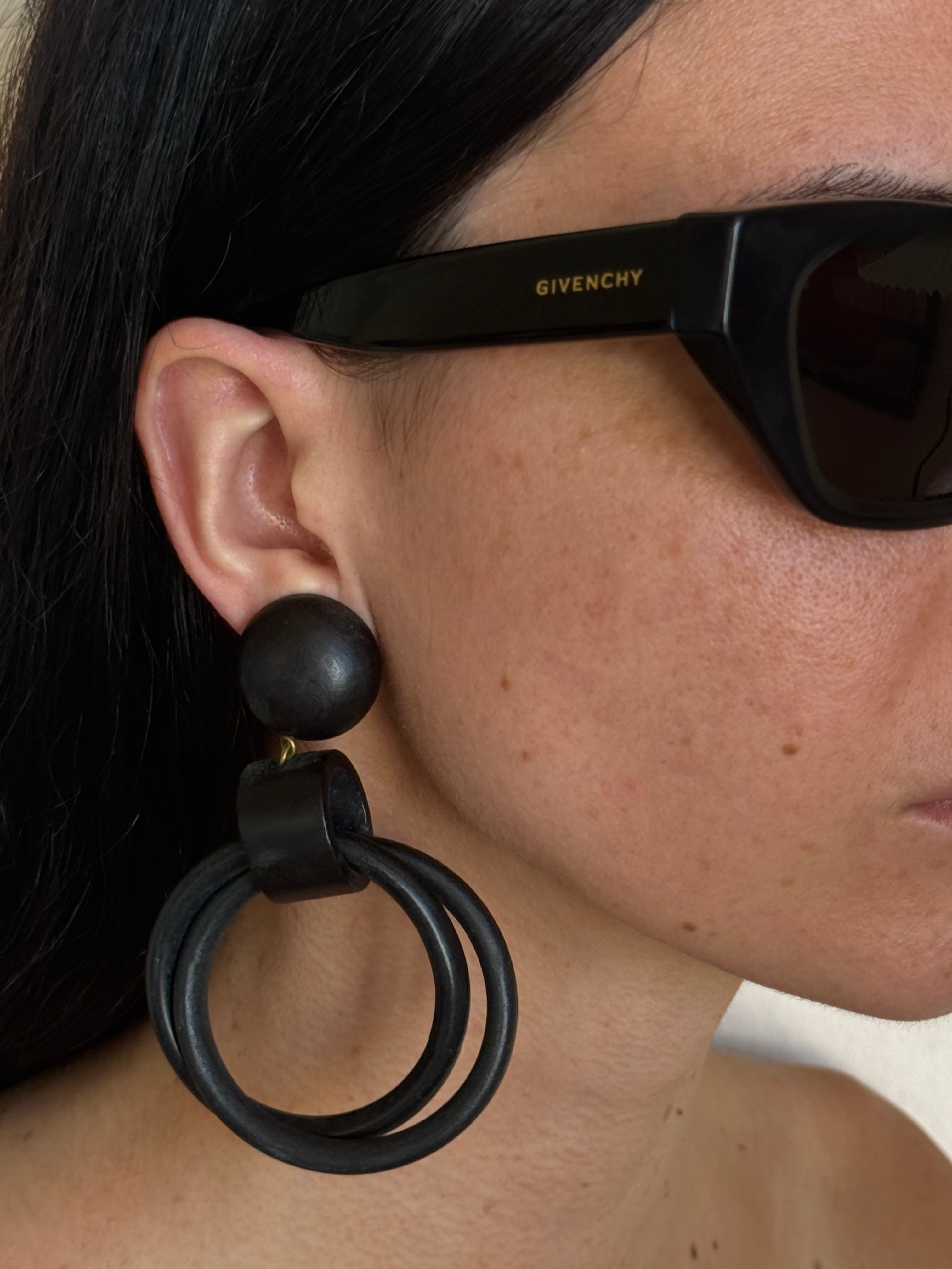 Vintage oversized wooden hoop earrings front view