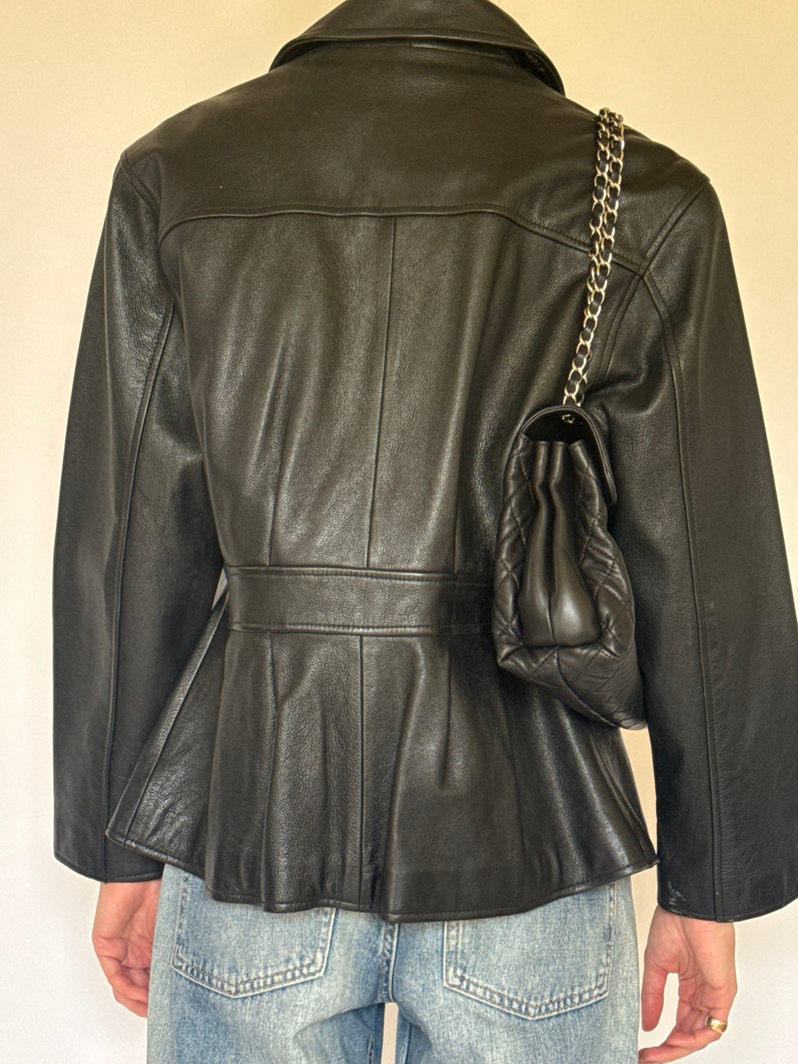 Black leather jacket back detail