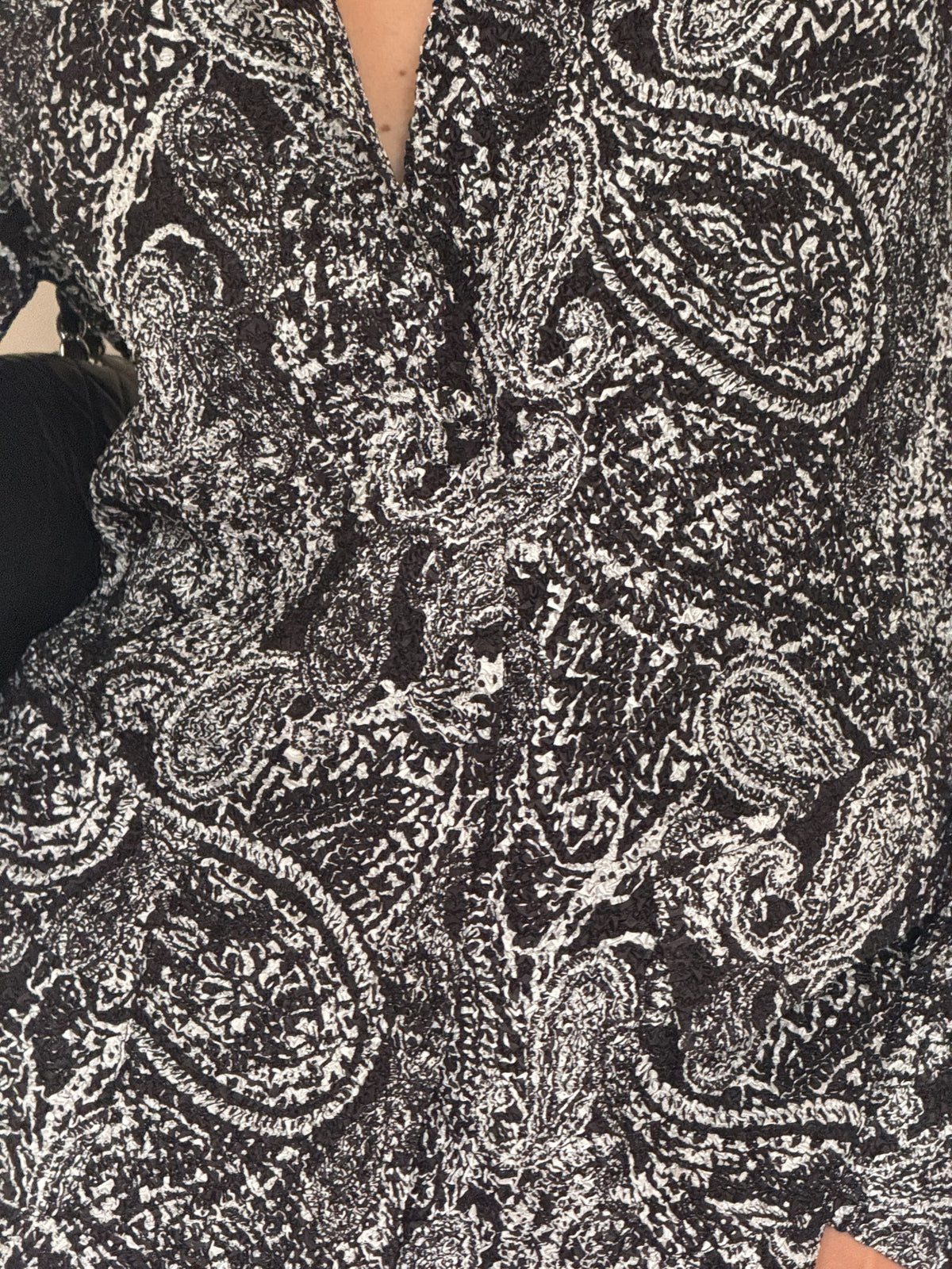 Vintage textured black and white paisley button-front blouse