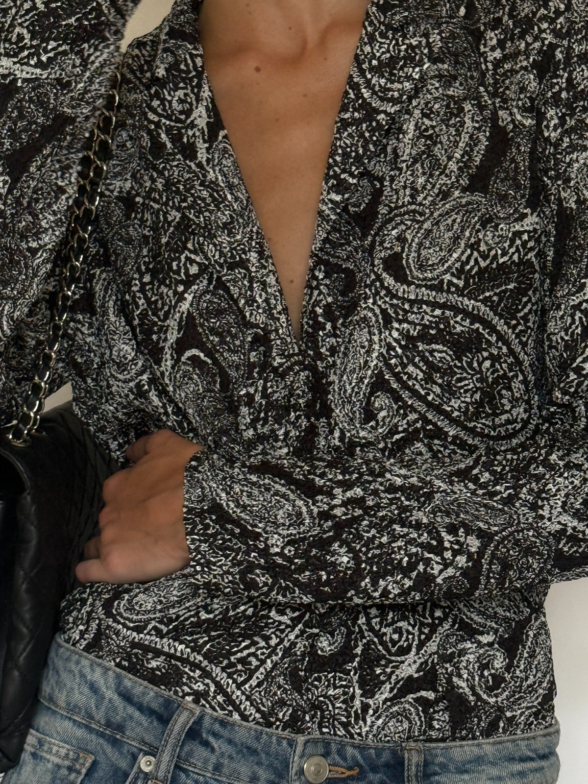 Vintage textured black and white paisley button-front blouse
