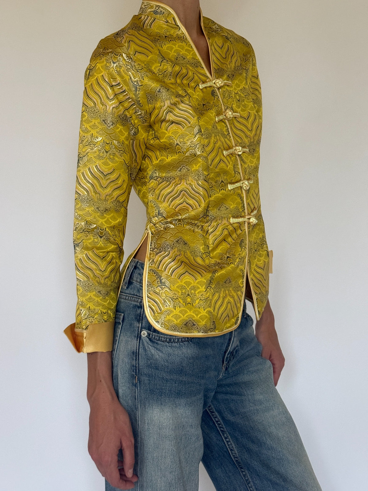 Vintage golden yellow brocade jacket front view with frog closures