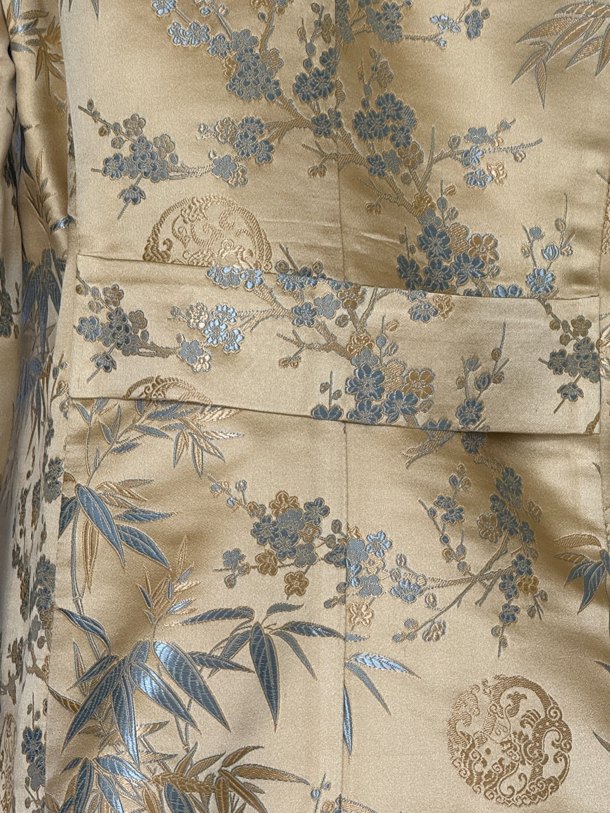 Vintage gold and blue brocade blazer flap pocket detail