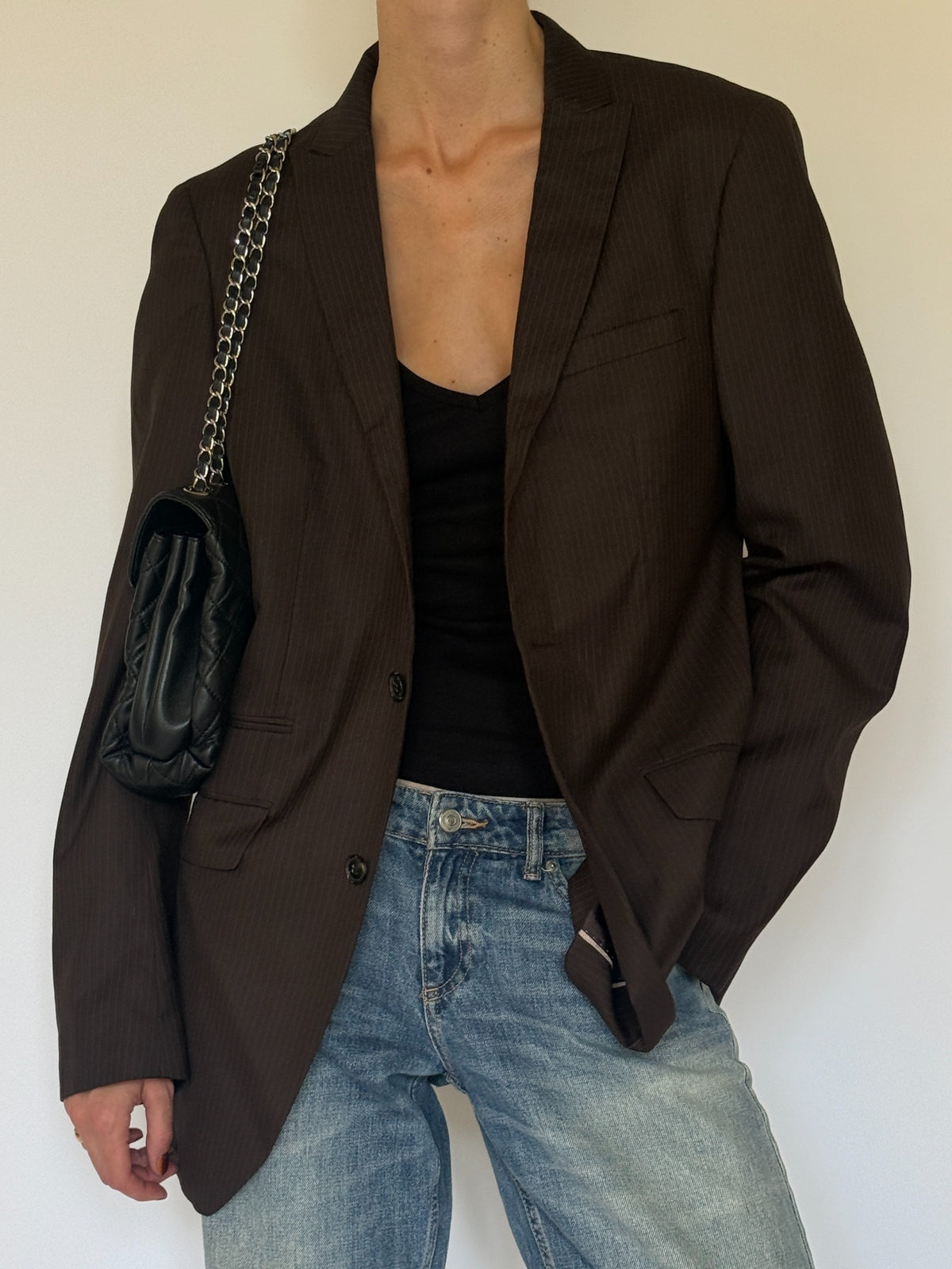 Vintage brown pinstripe blazer front detail with notch lapels