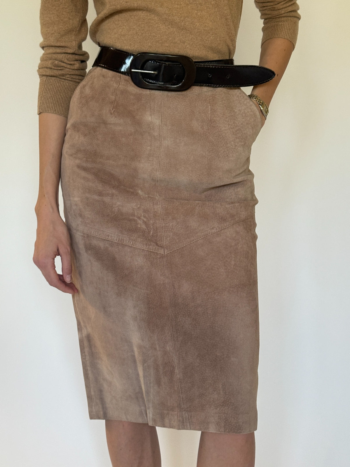 Vintage suede midi skirt full front styled view with fitted midi silhouette