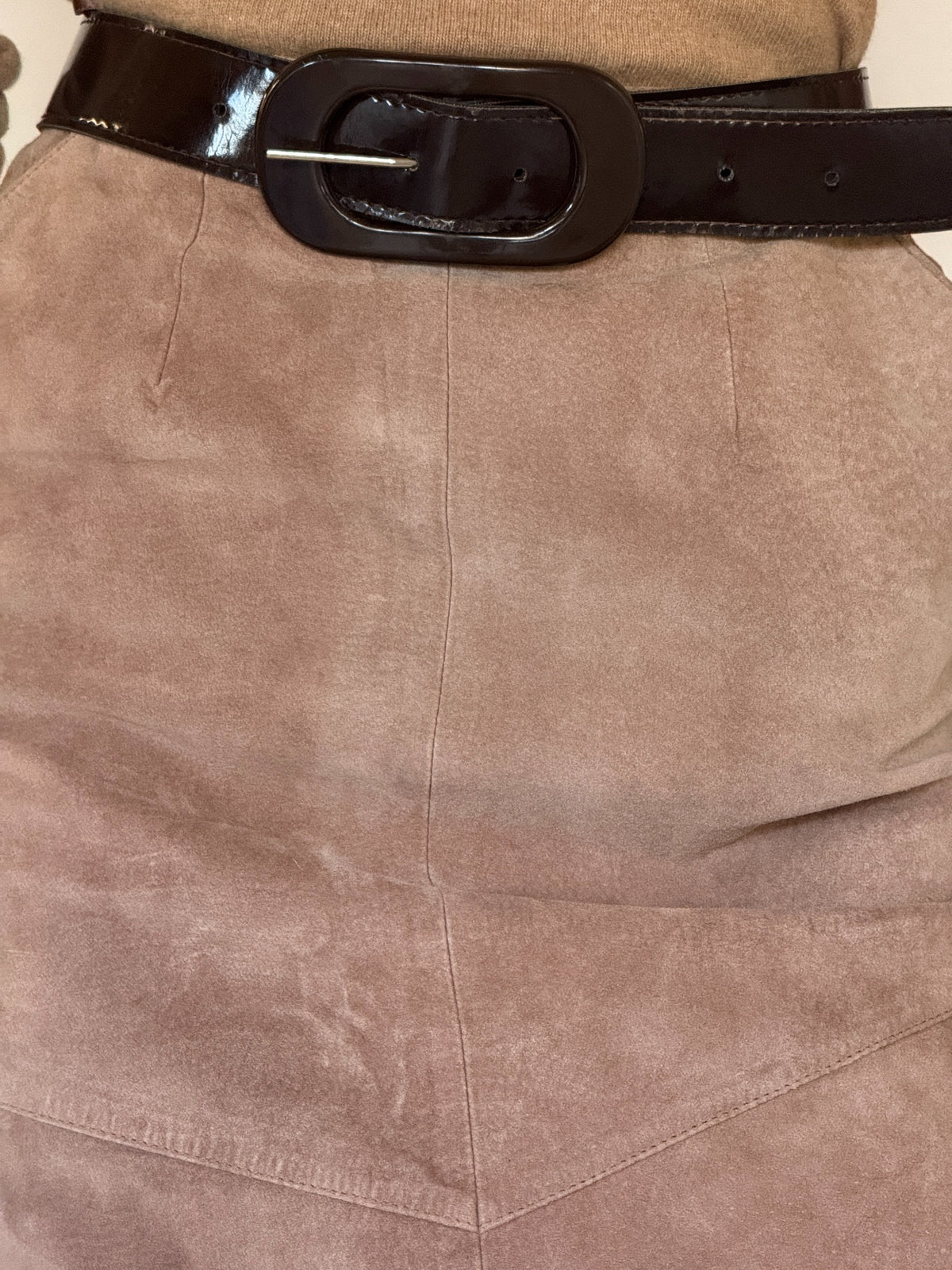 Vintage suede midi skirt side view in taupe brown with fitted high-waisted silhouette