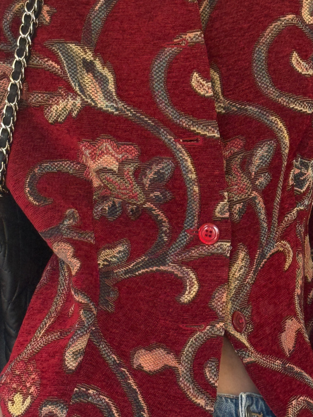 Vintage burgundy tapestry jacket woven floral fabric close-up