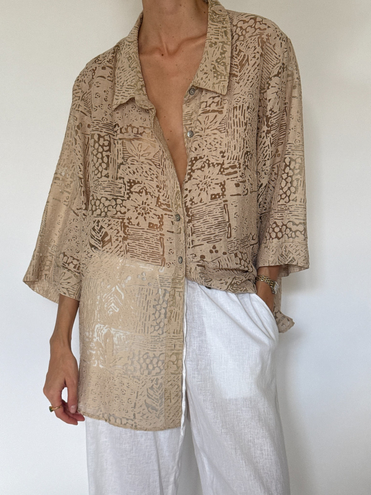 Oversized beige abstract burnout patterned button-up blouse