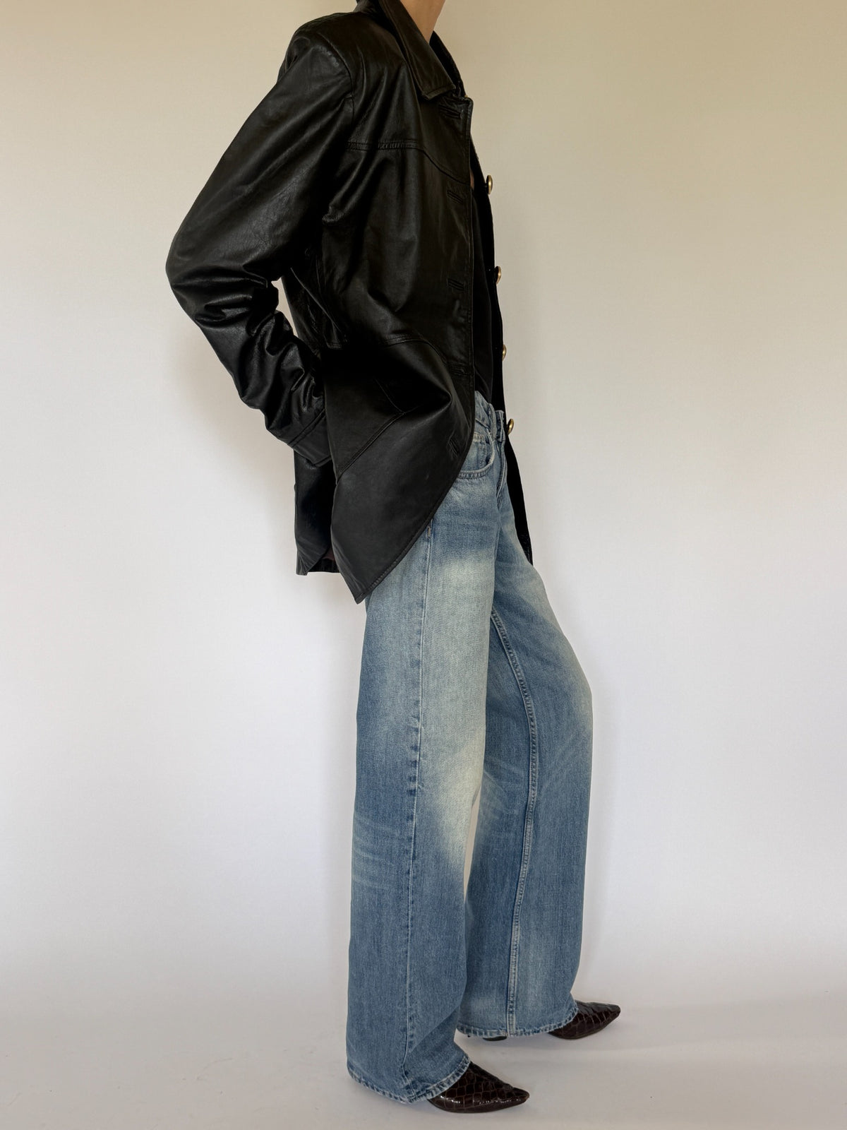 Vintage black leather jacket cuff detail