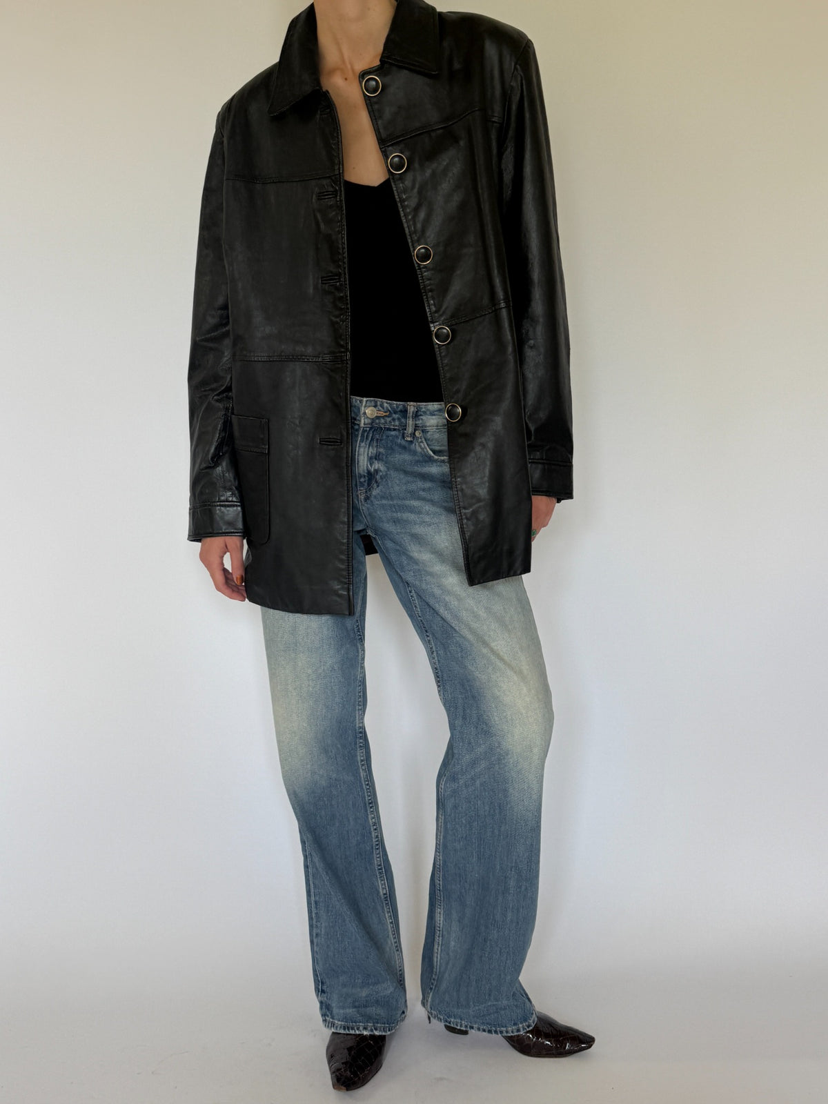 Vintage black leather jacket front view