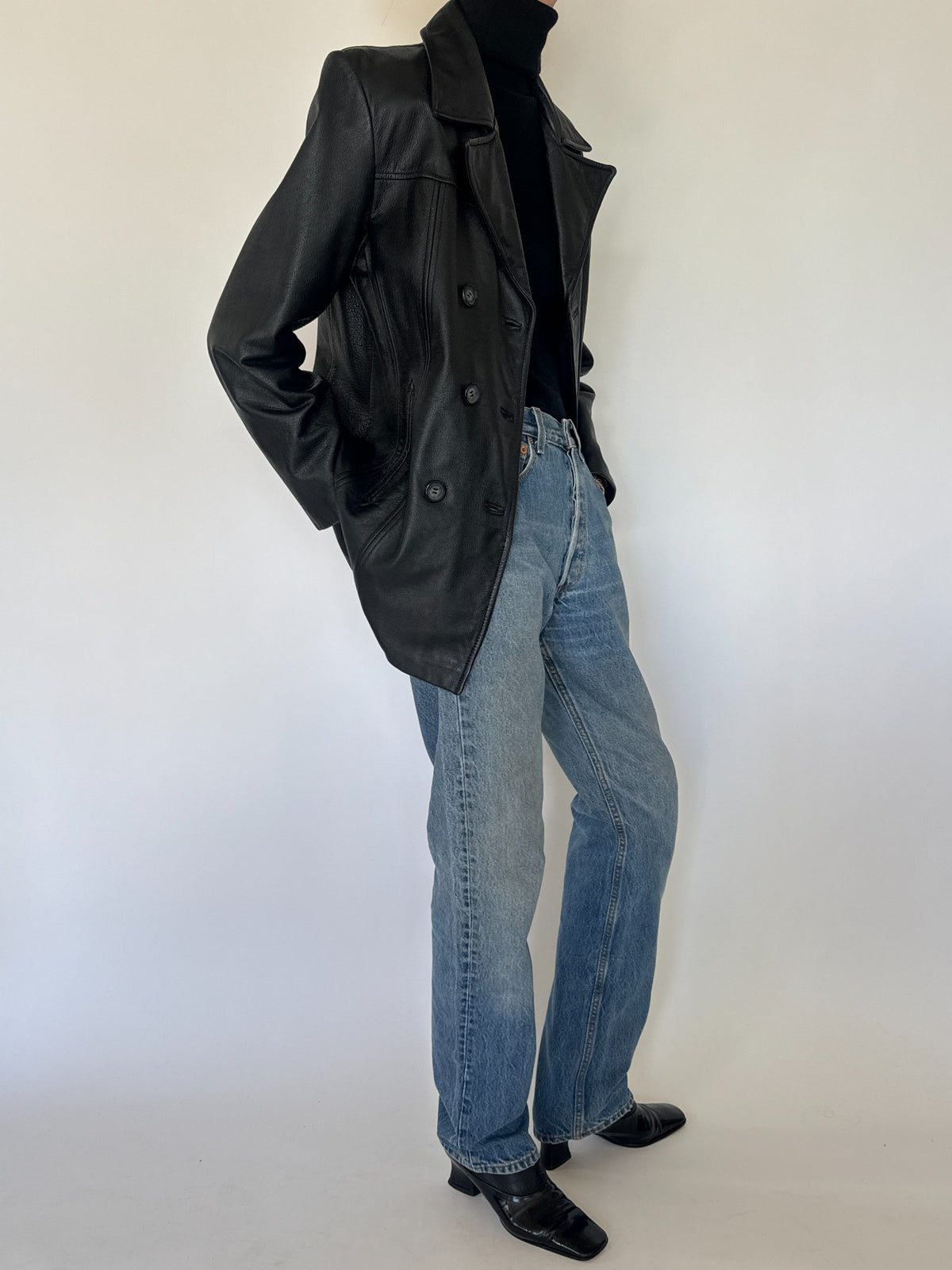 Vintage black double-breasted leather blazer detail and styling