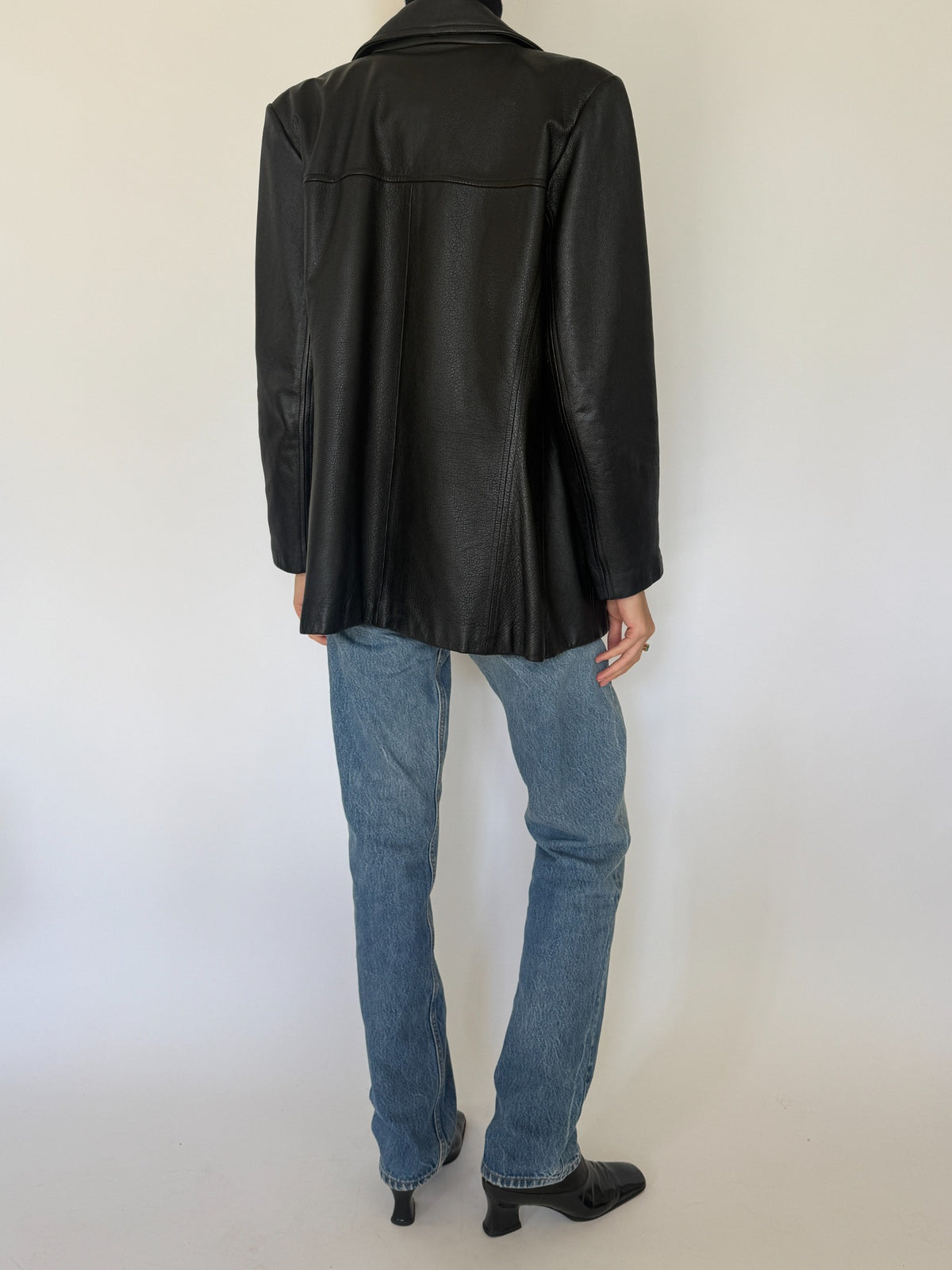 Vintage black double-breasted leather blazer detail and styling