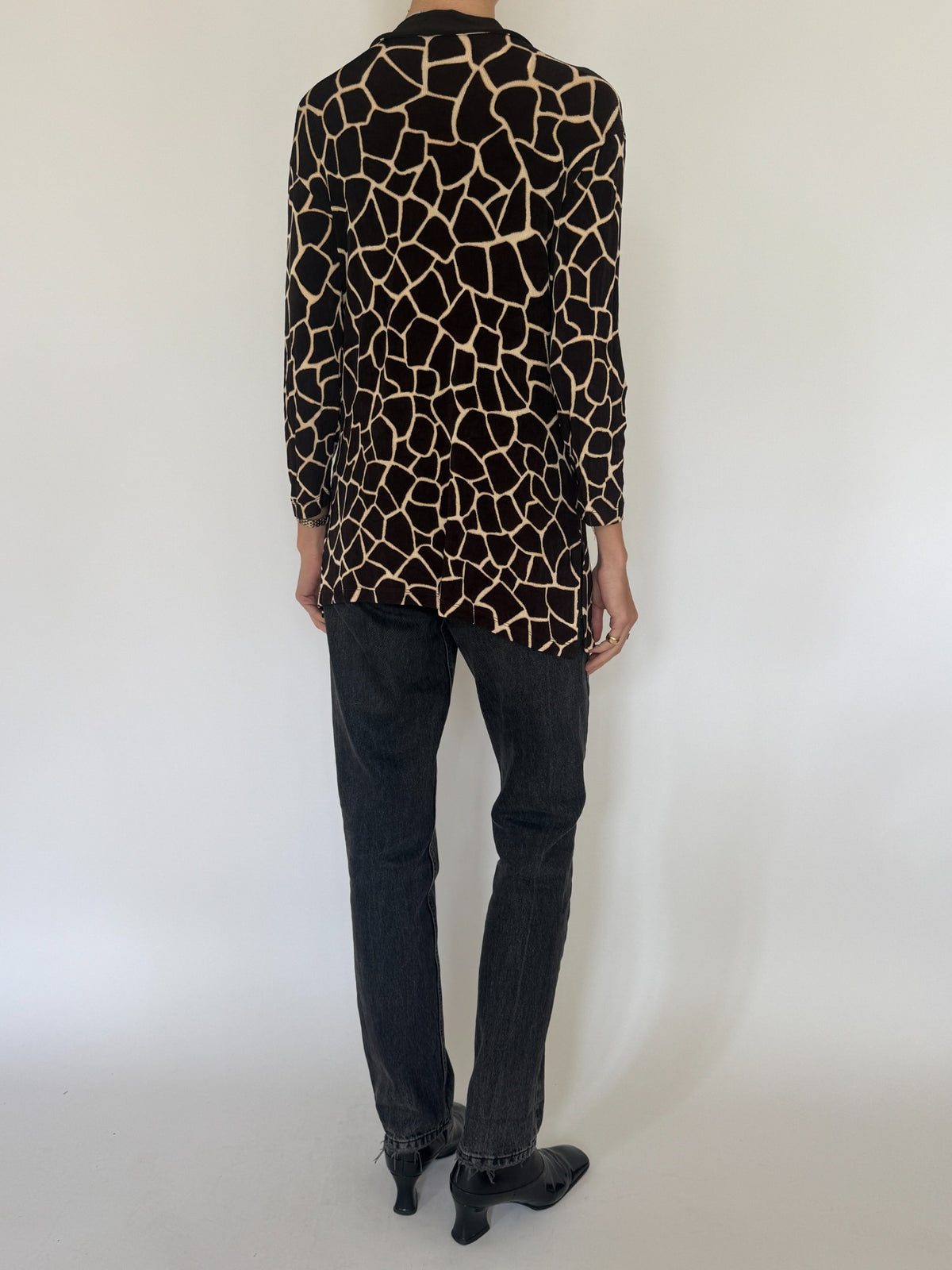 Black and cream abstract animal print V-neck long tunic top