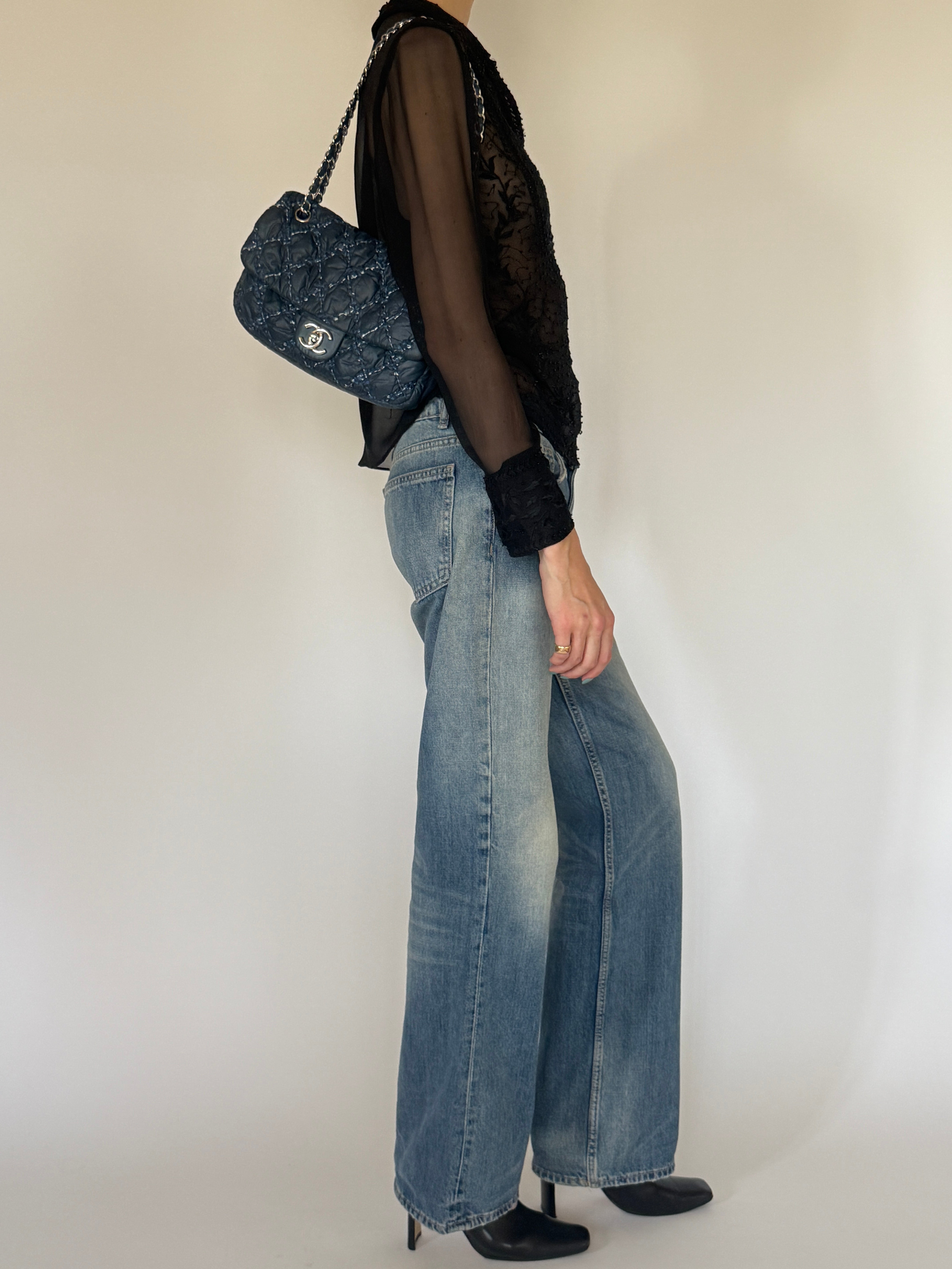 Vintage sheer black embroidered blouse side view