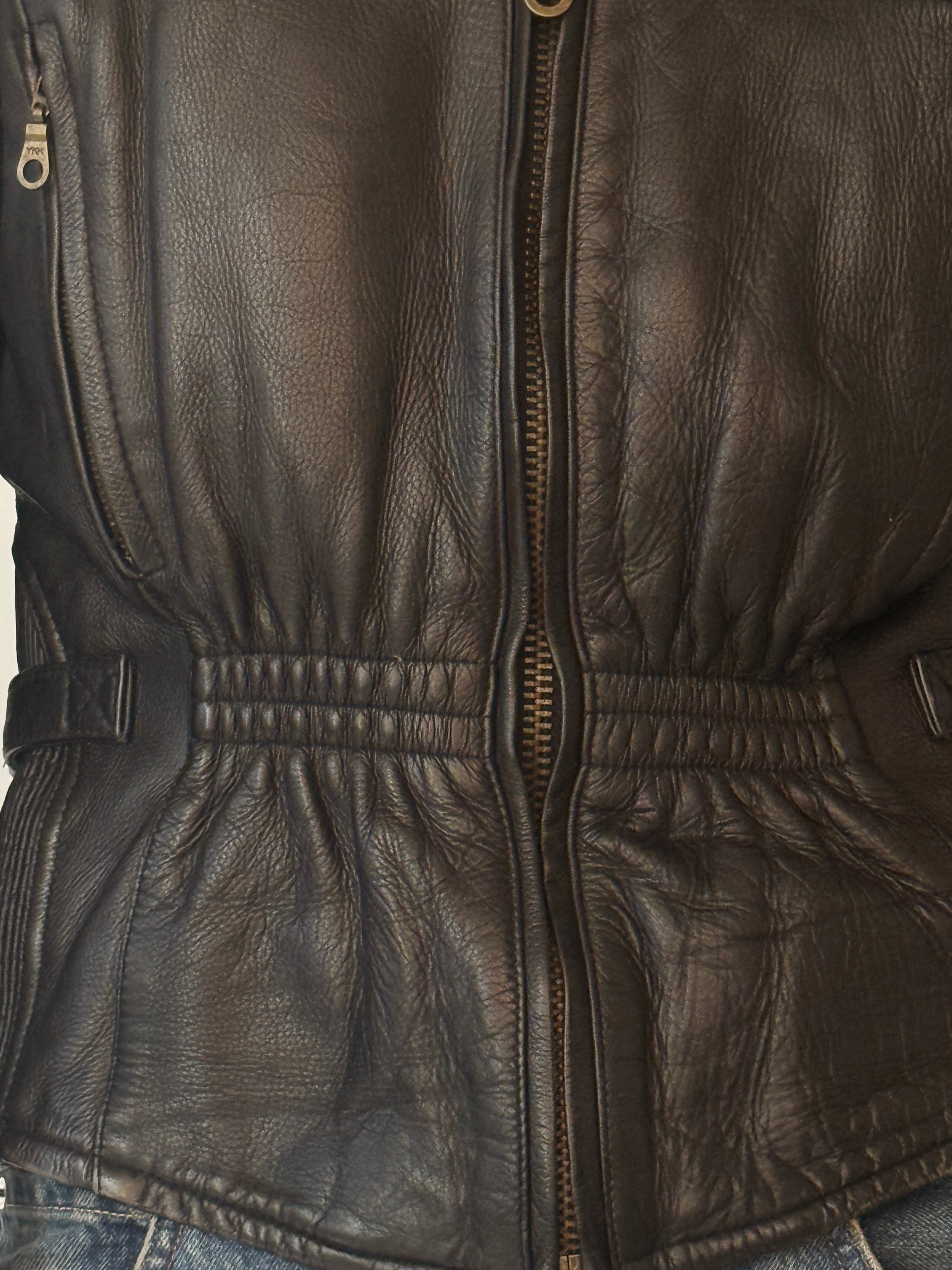 Vintage black leather jacket leather close-up