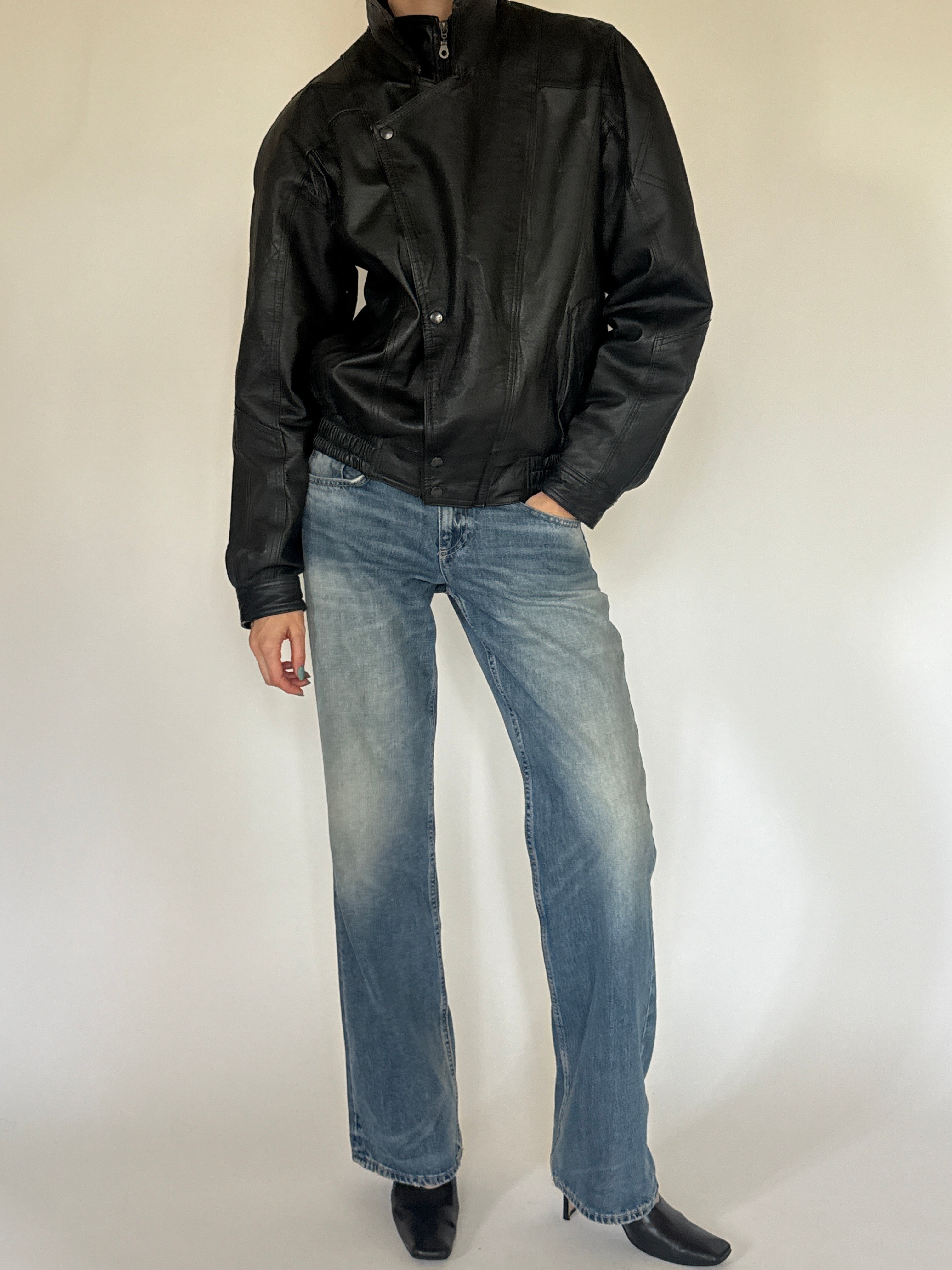 Vintage oversized black leather bomber jacket full body fit view
