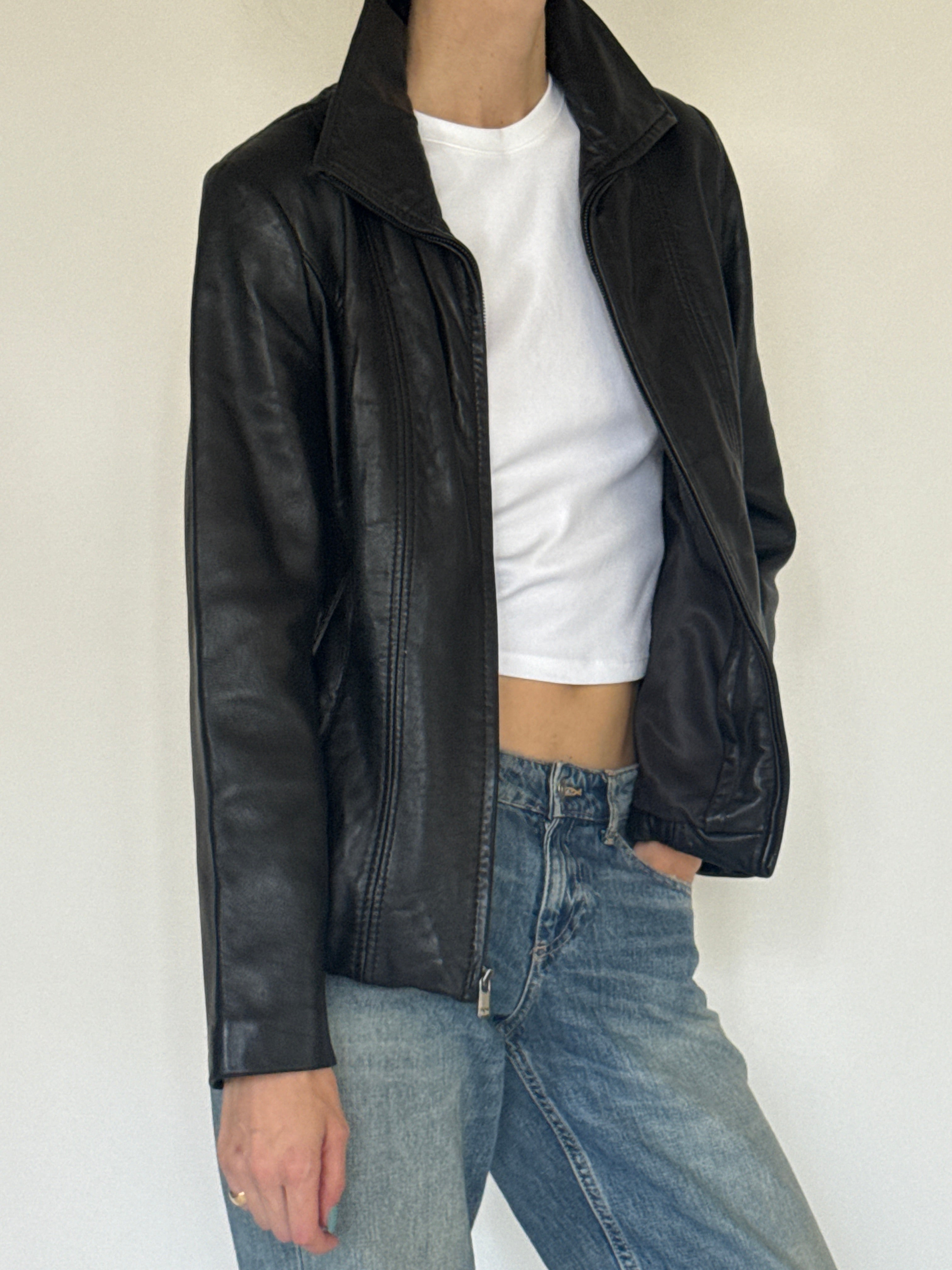 Vintage black leather jacket side view