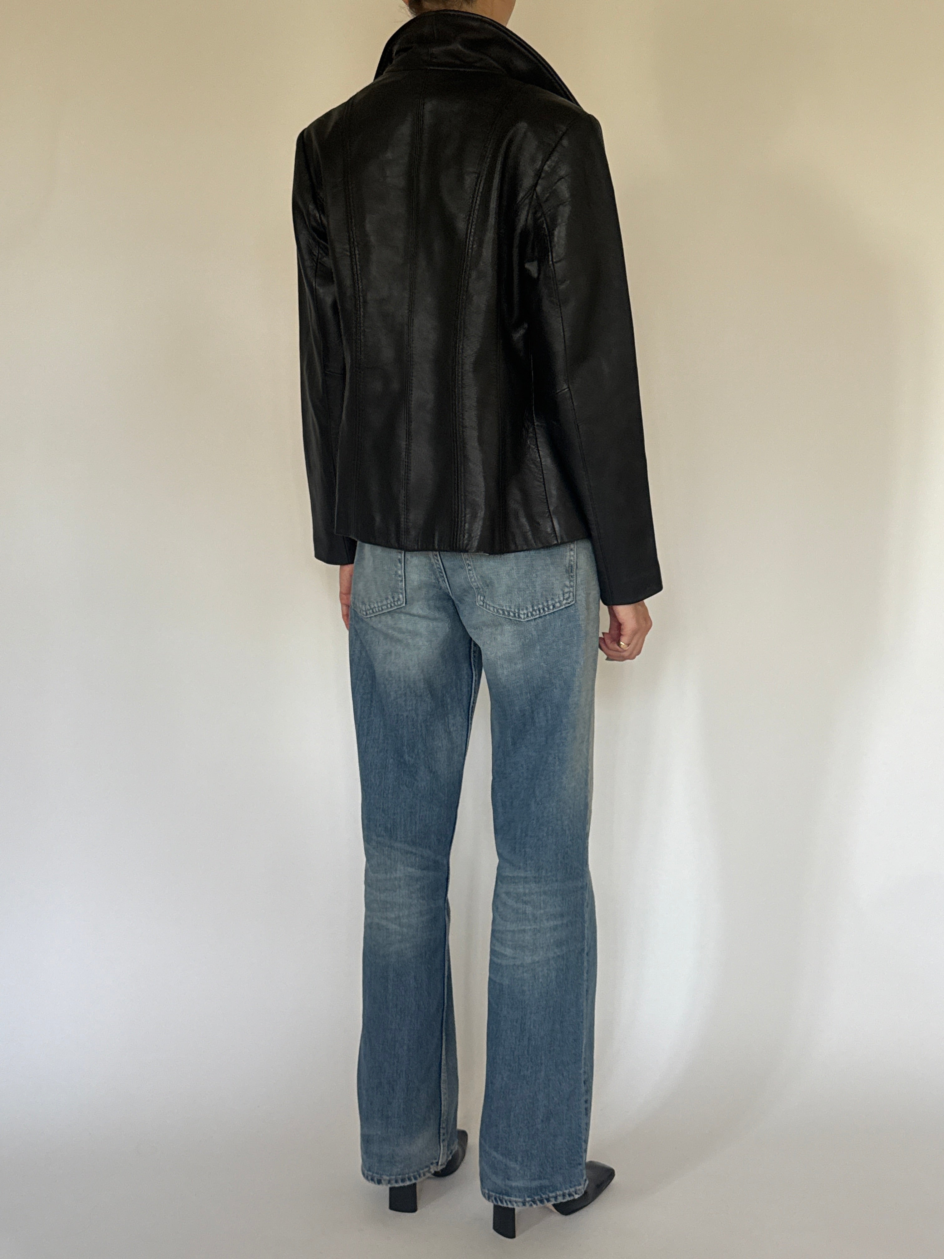 Vintage black leather jacket back view