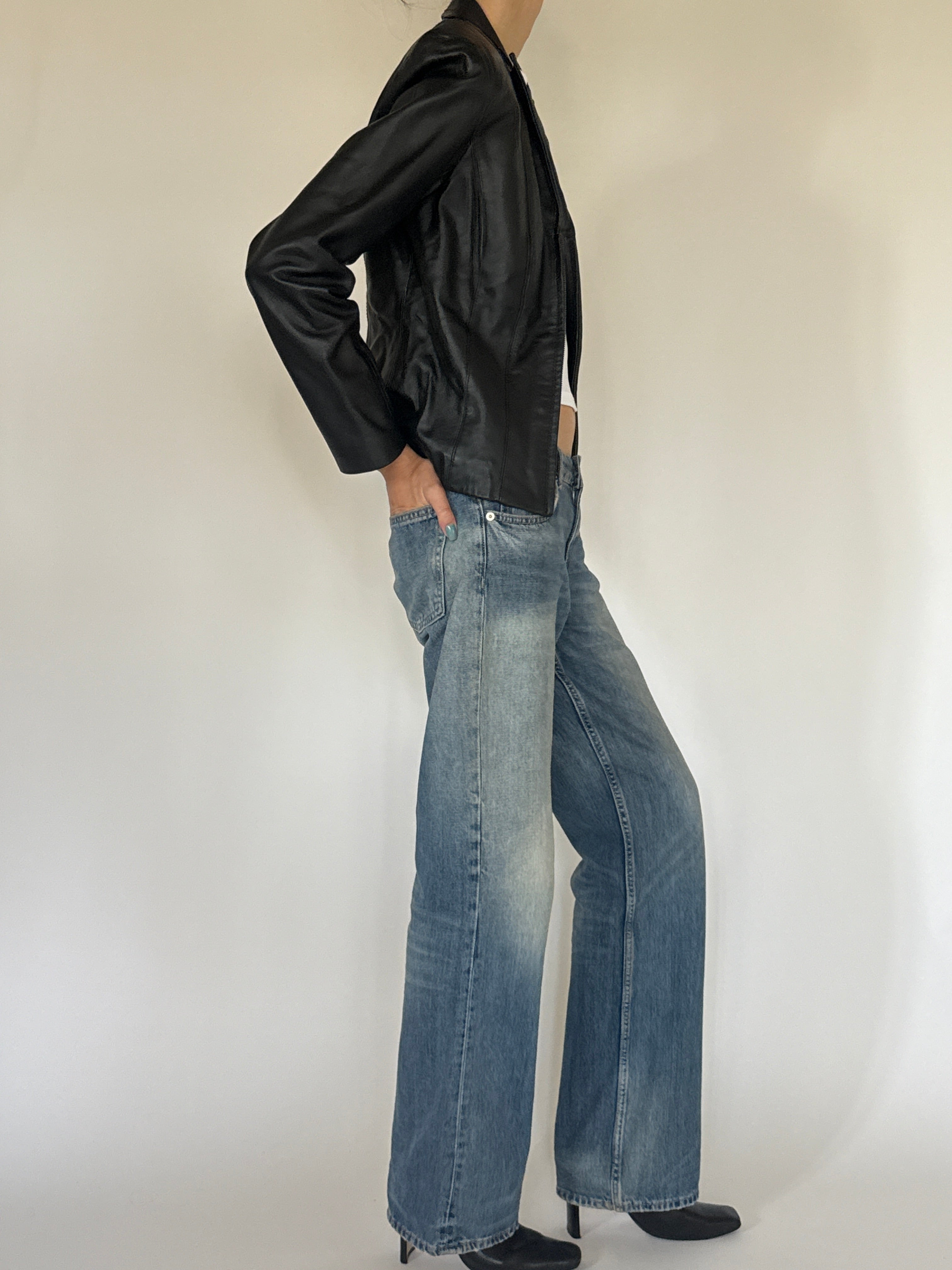 Vintage black leather jacket side view