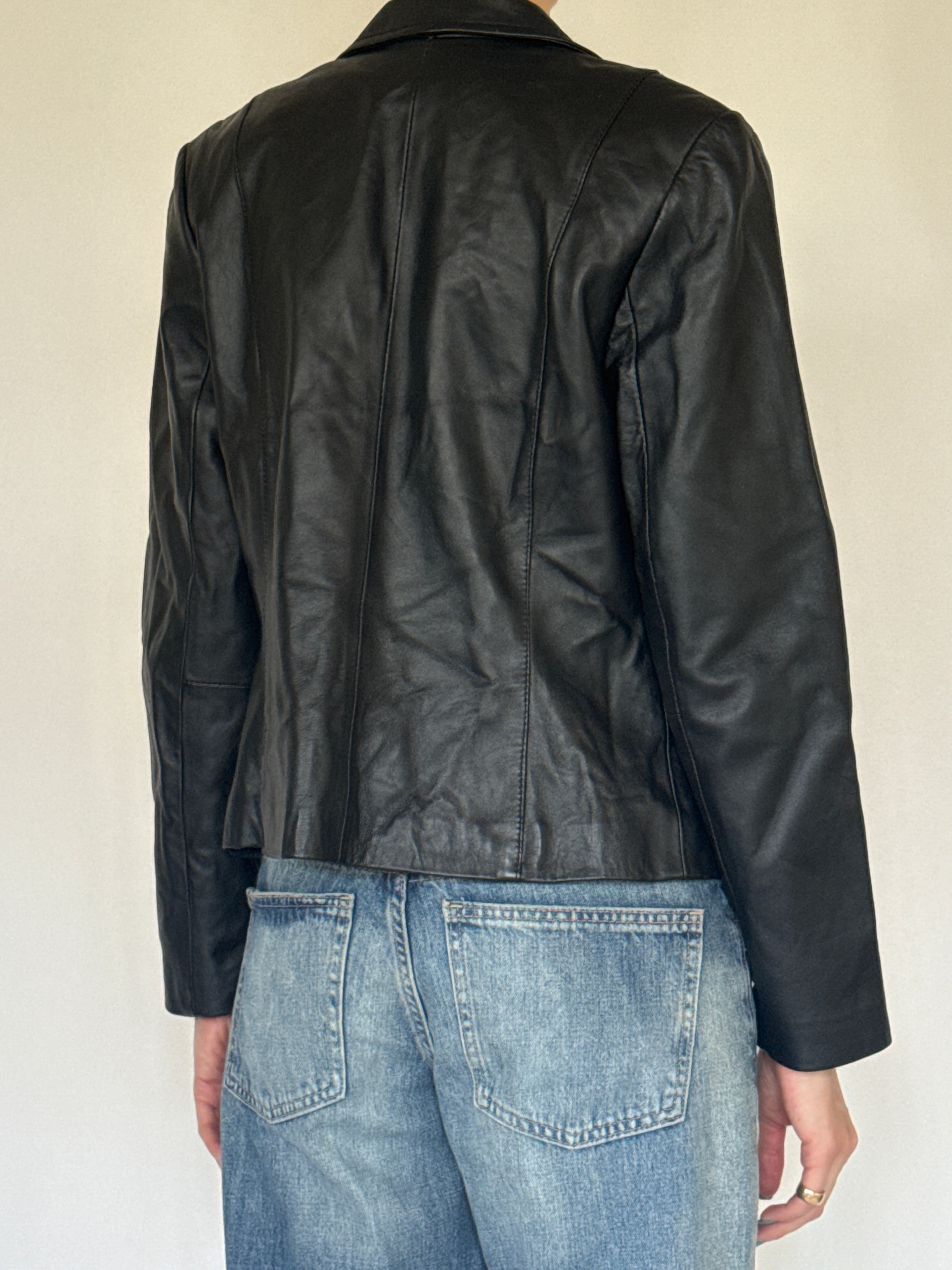 Vintage black leather jacket back view