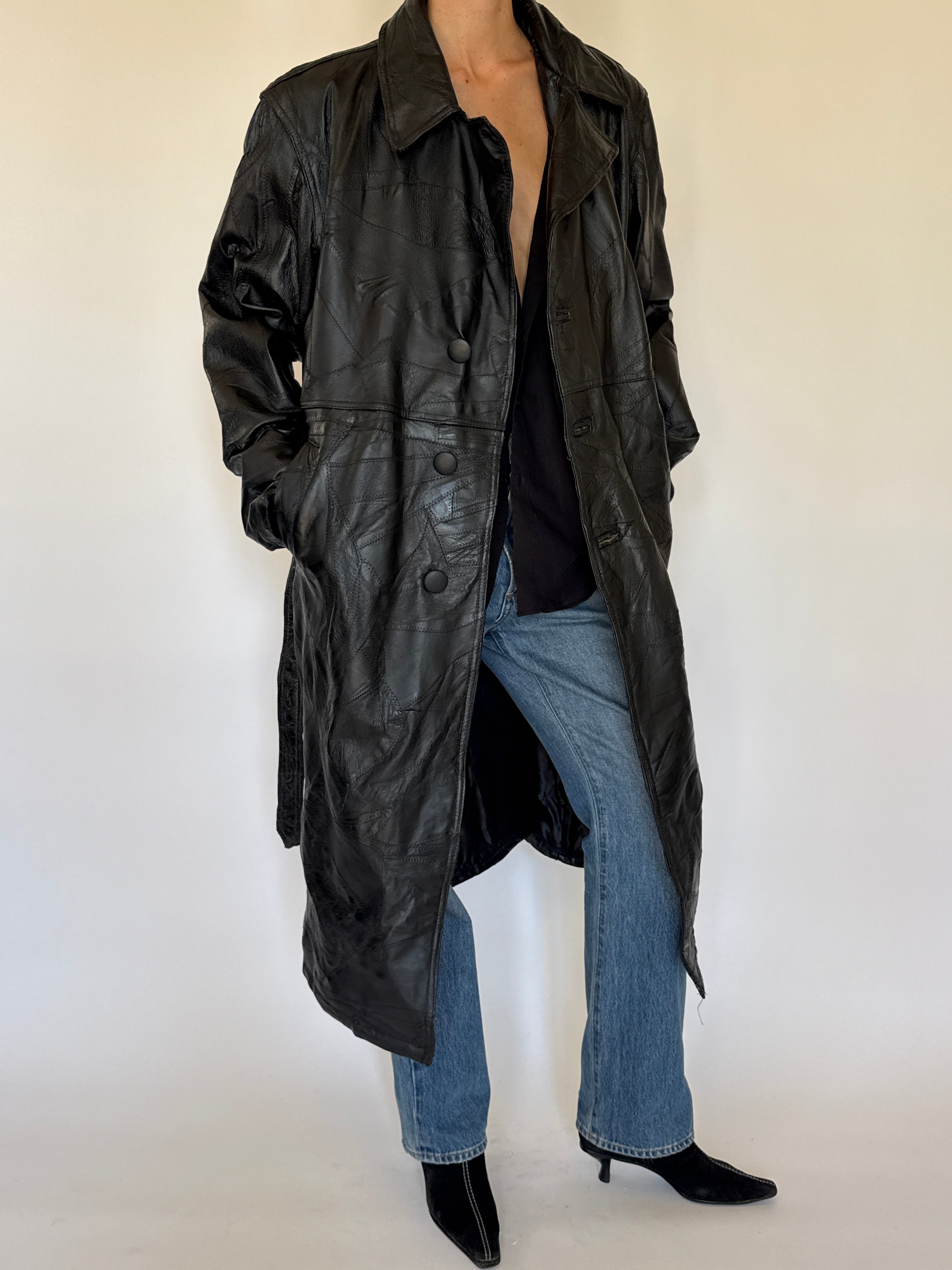 Vintage black leather trench coat full-length view