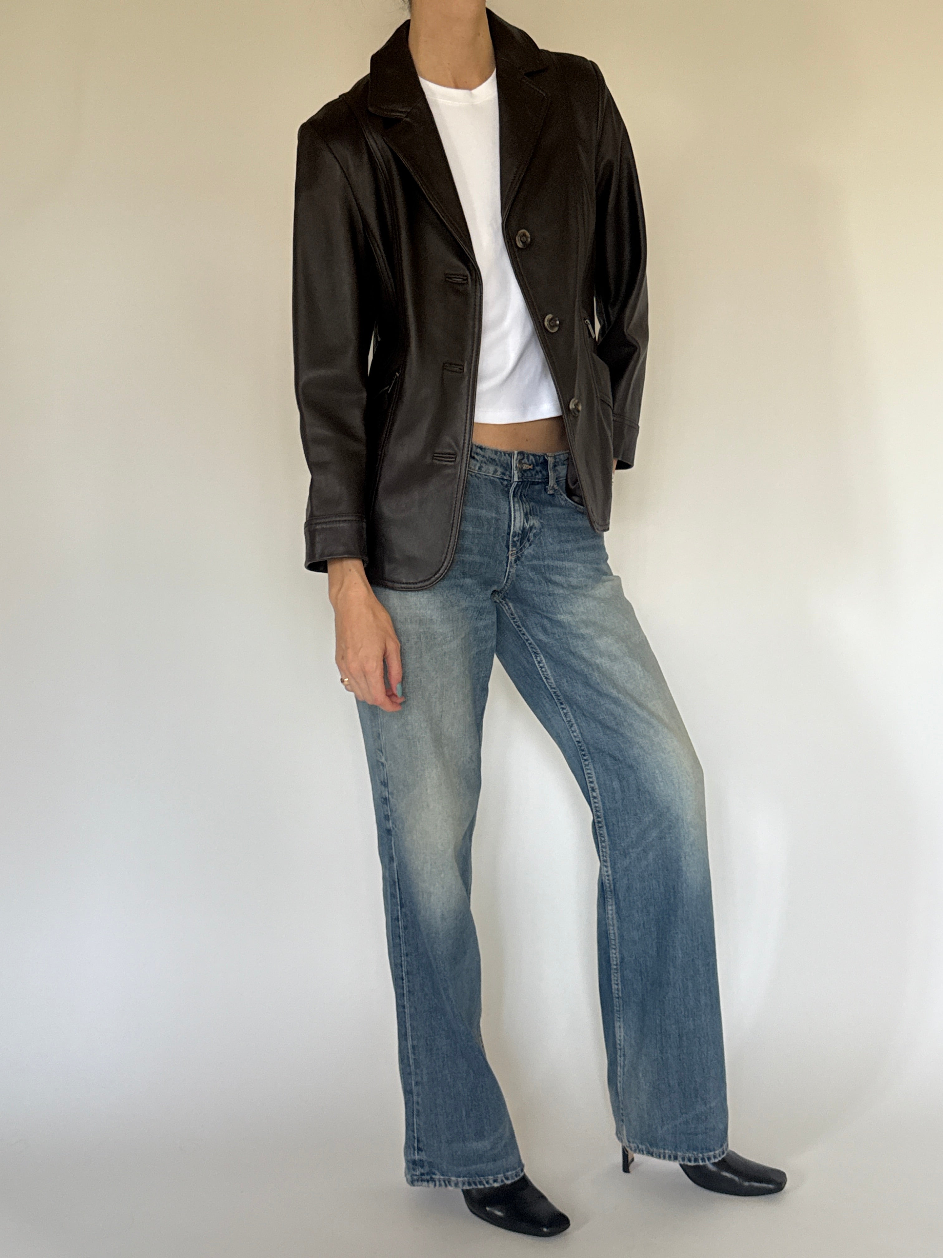 Vintage fitted leather jacket side view
