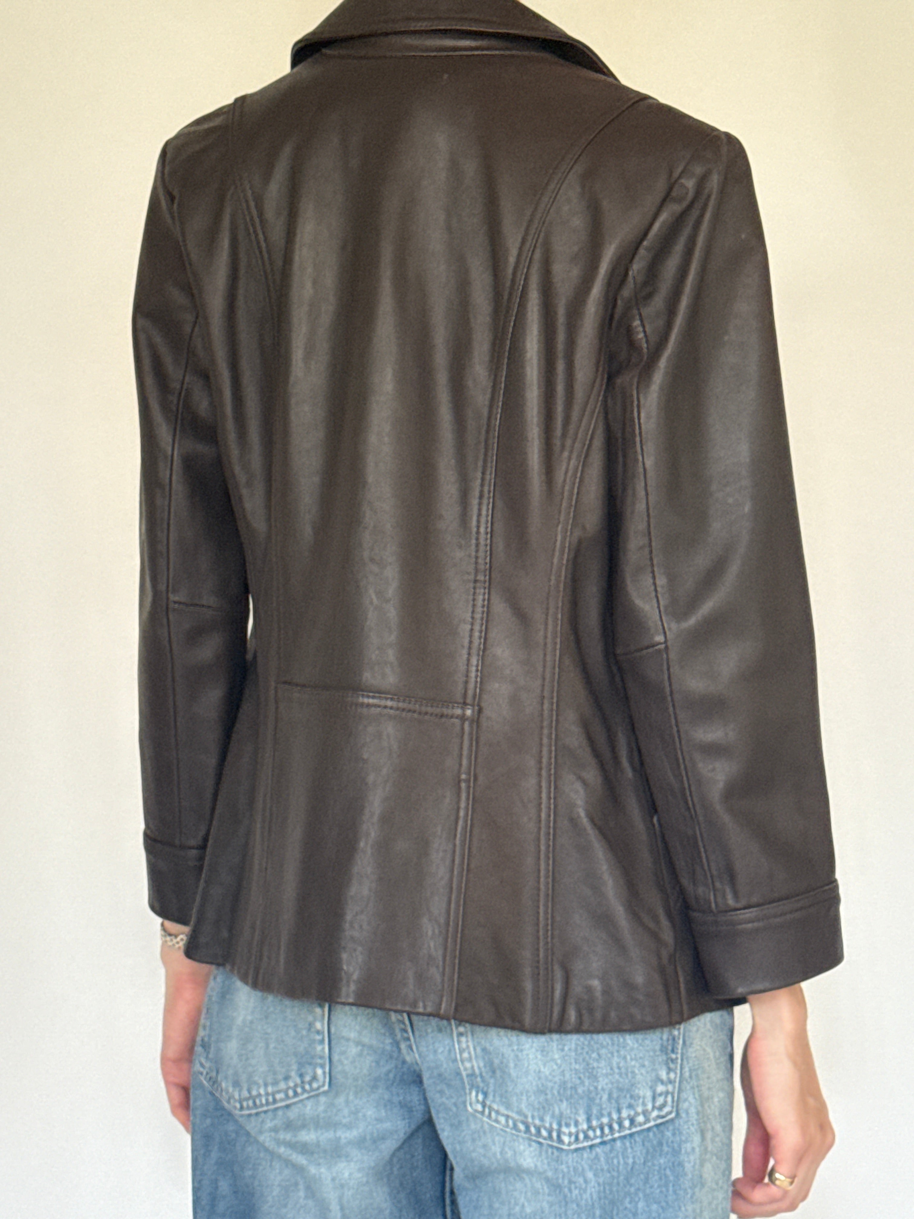 Vintage dark brown leather jacket back view