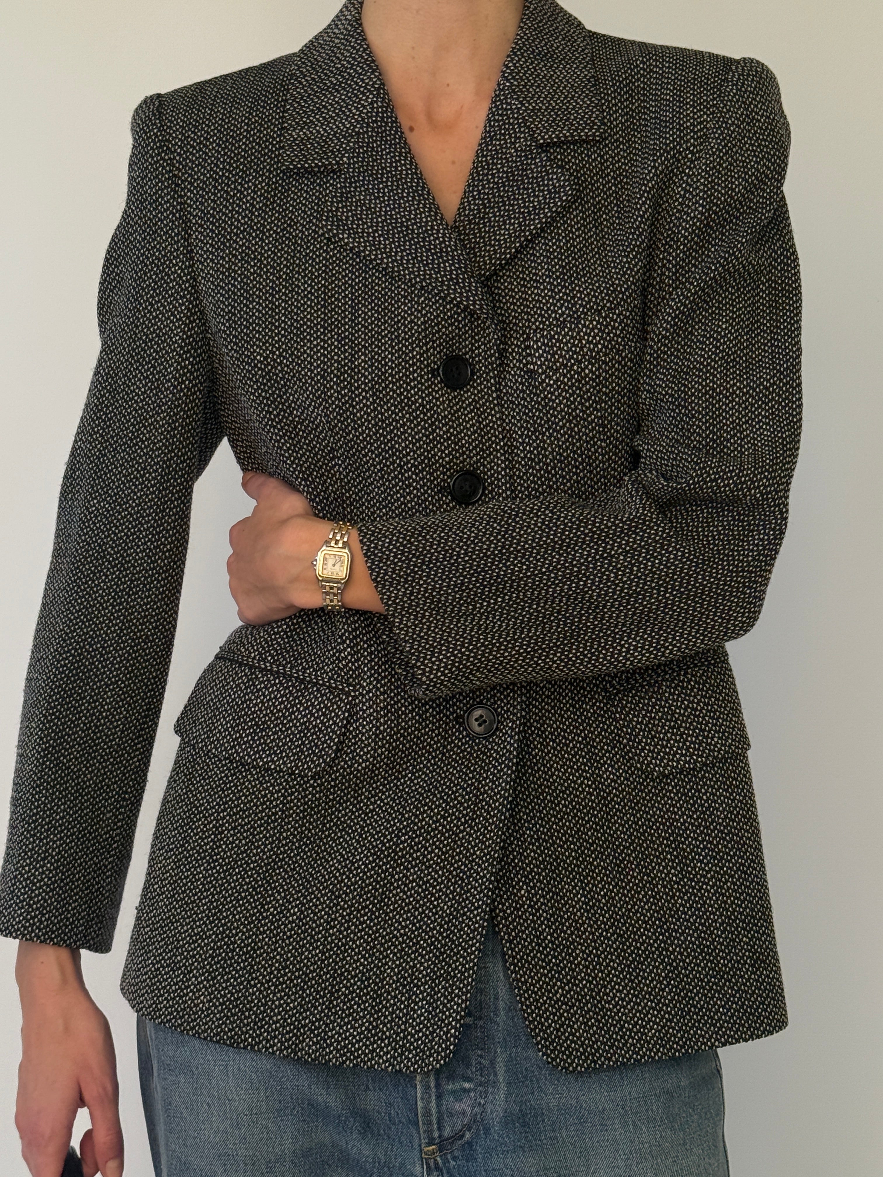 Vintage charcoal blazer showing structured shoulders