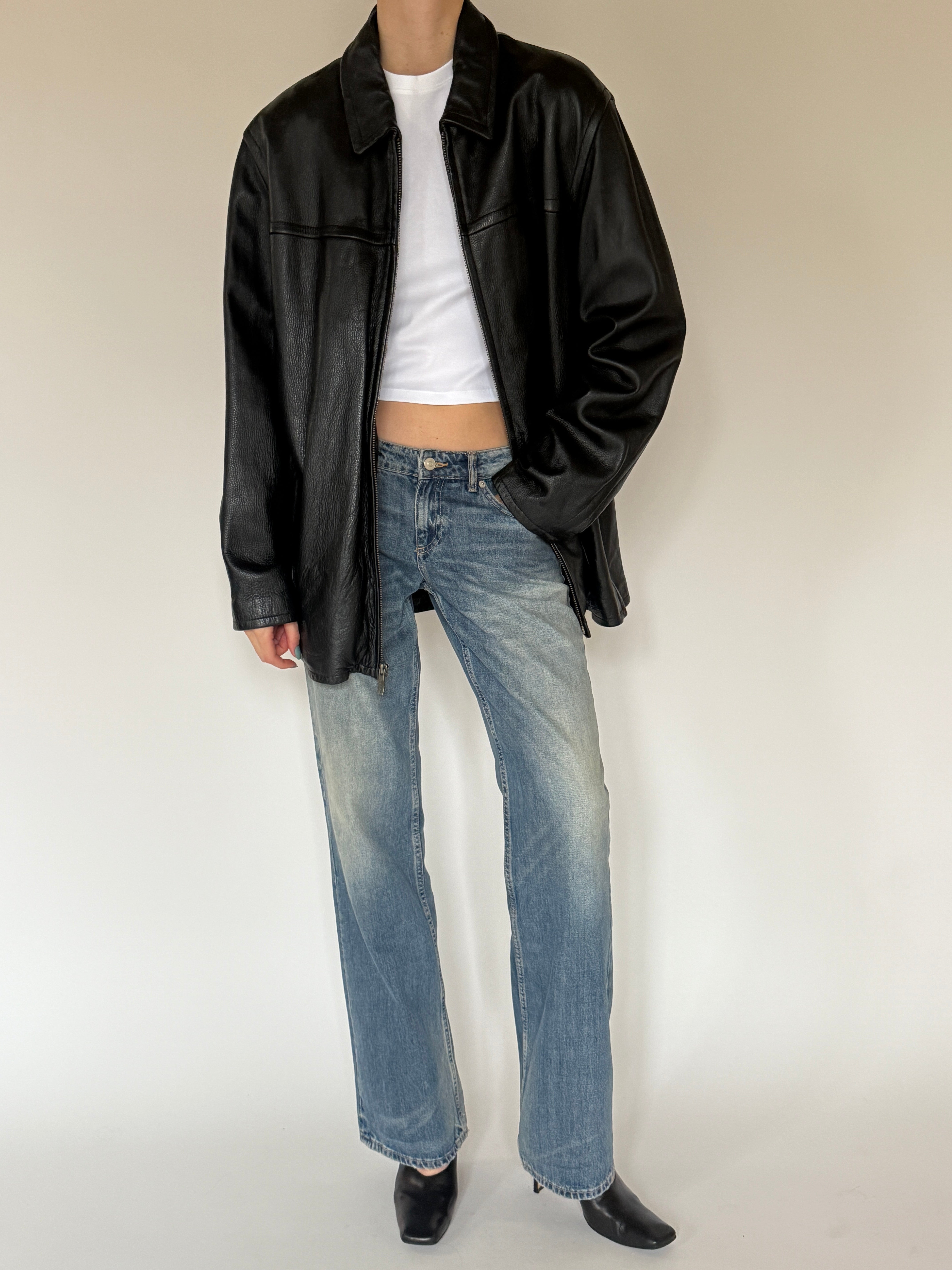 Vintage oversized black leather jacket front view