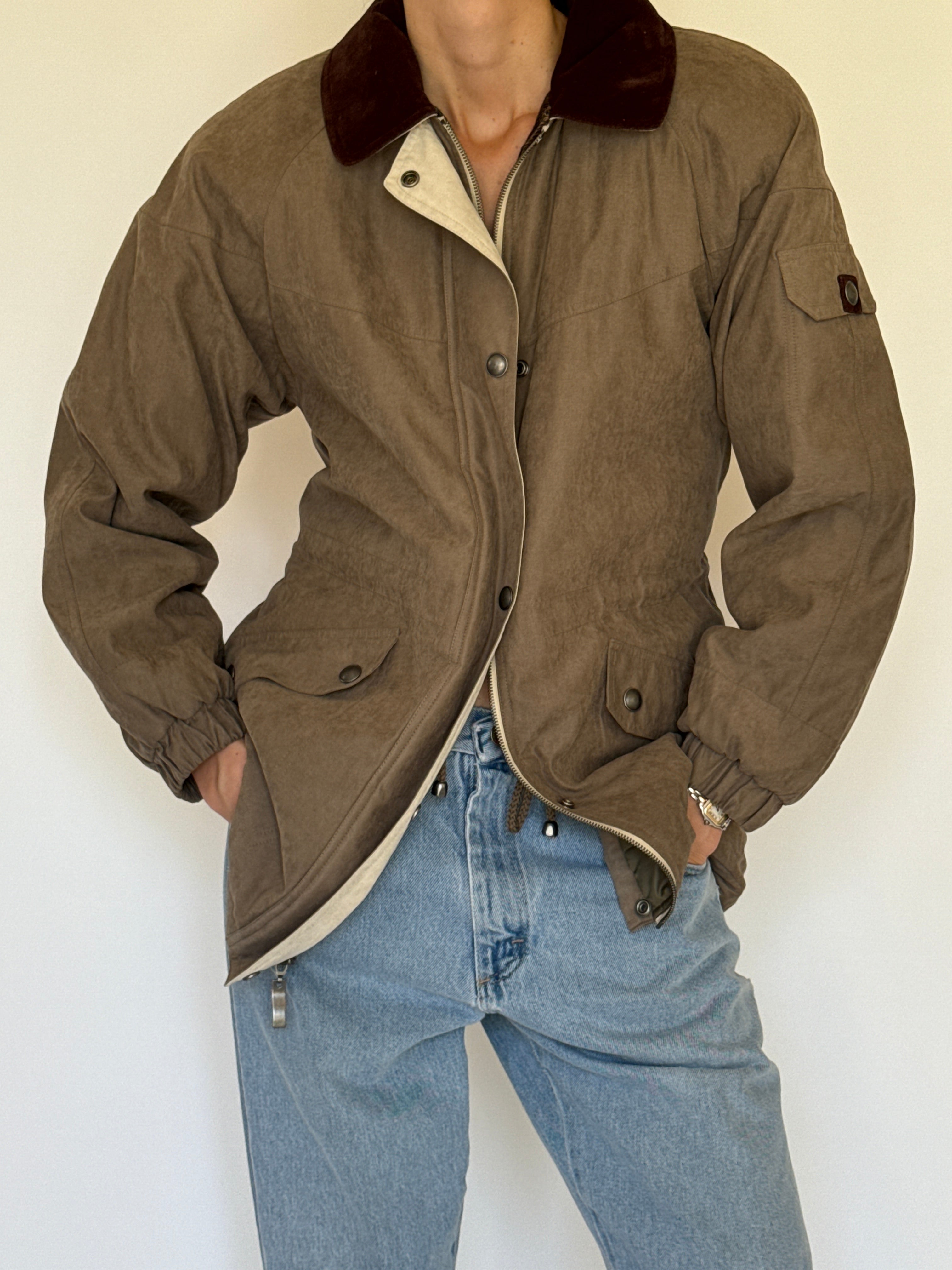 Vintage brown field jacket fabric close-up textured surface