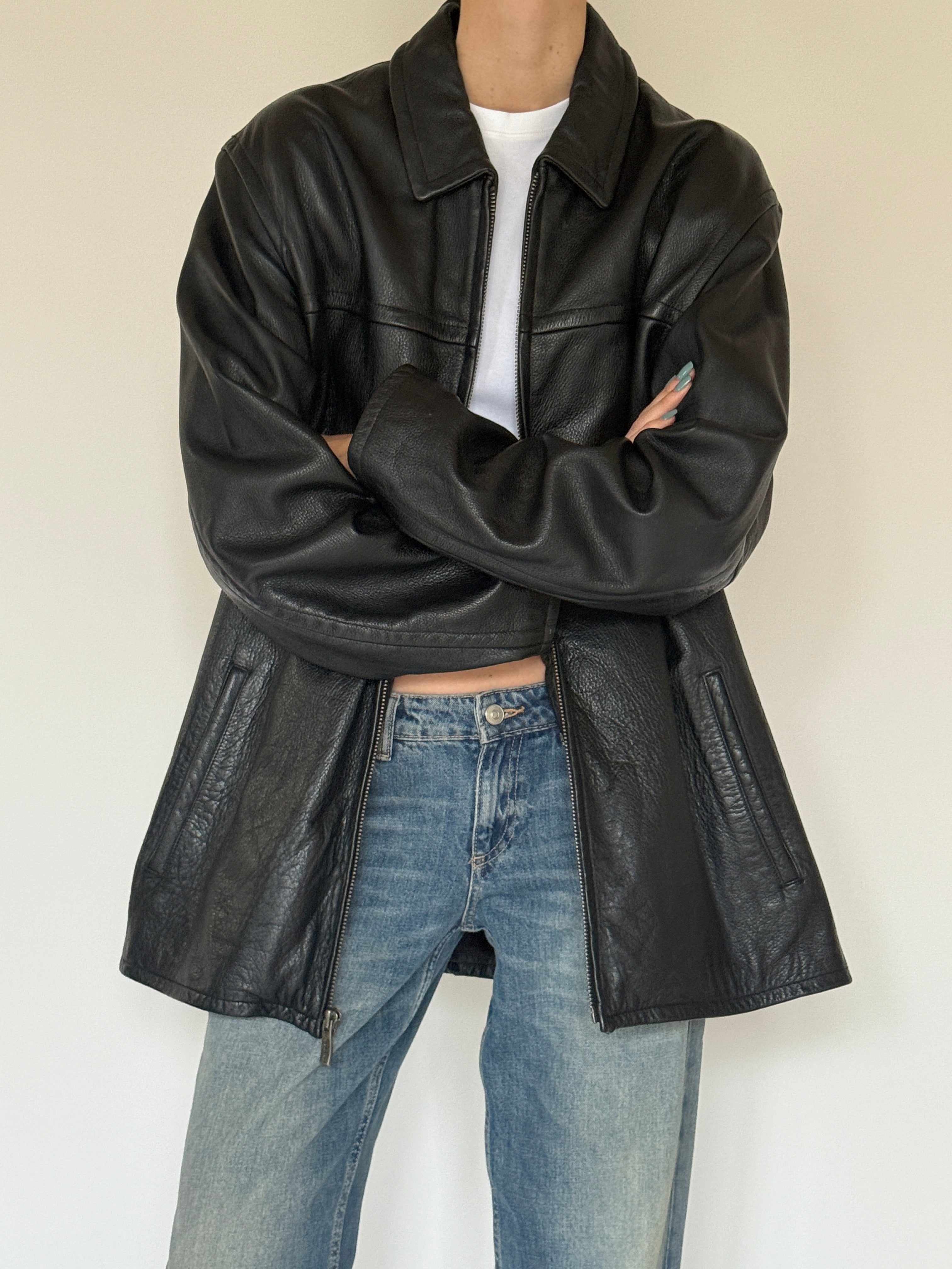 Vintage oversized black leather jacket side view