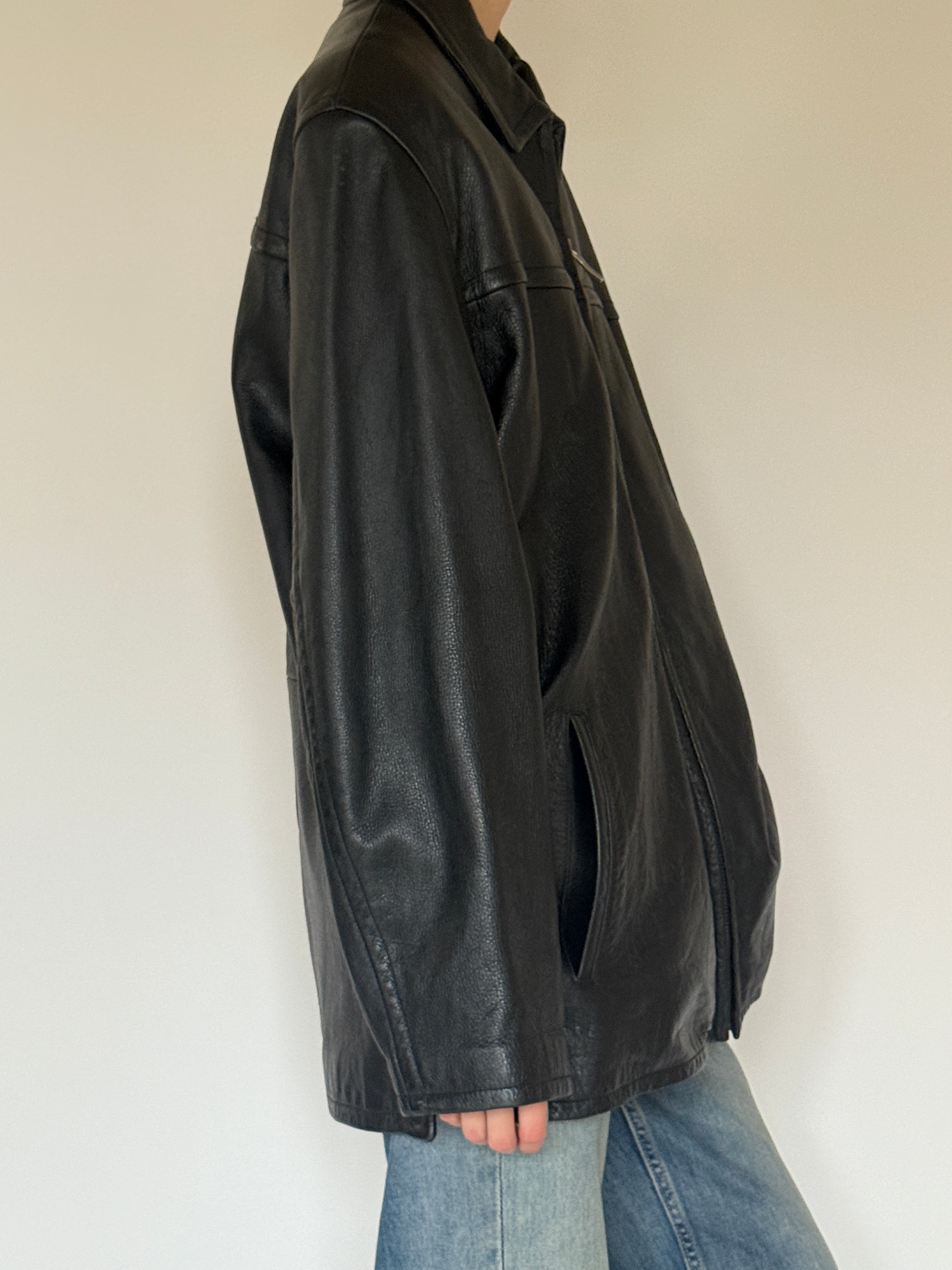 Vintage oversized black leather jacket side view