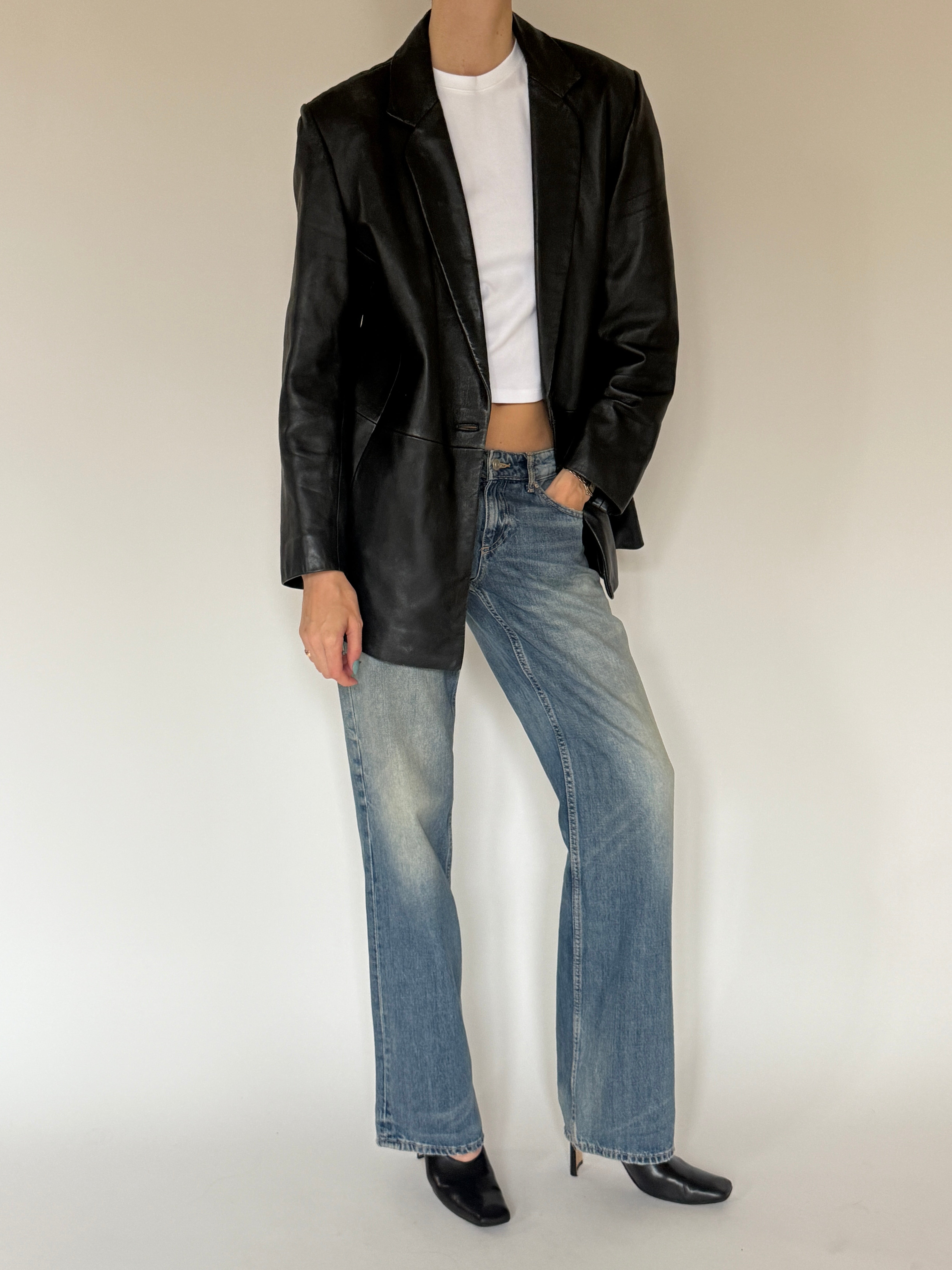 Vintage black leather blazer front view with single-button closure