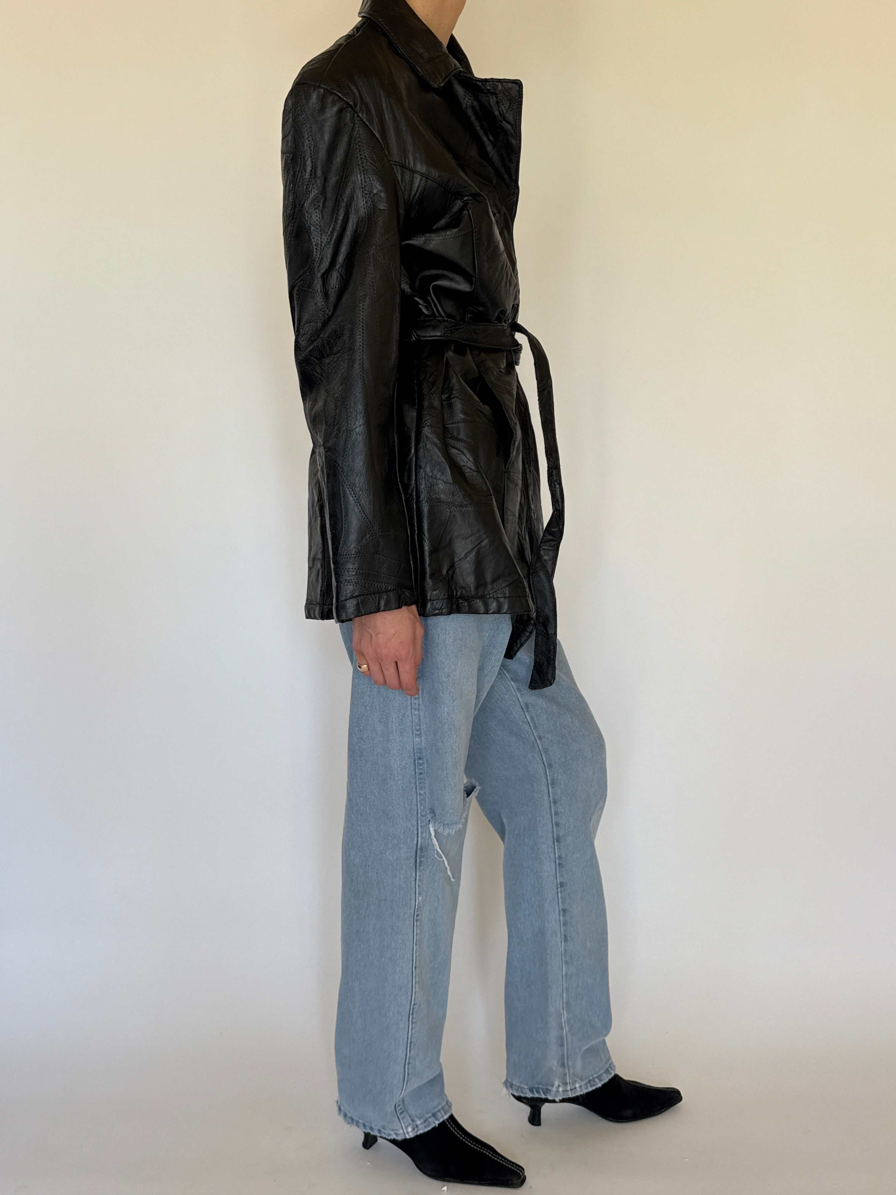 Vintage patchwork leather belted jacket black side view