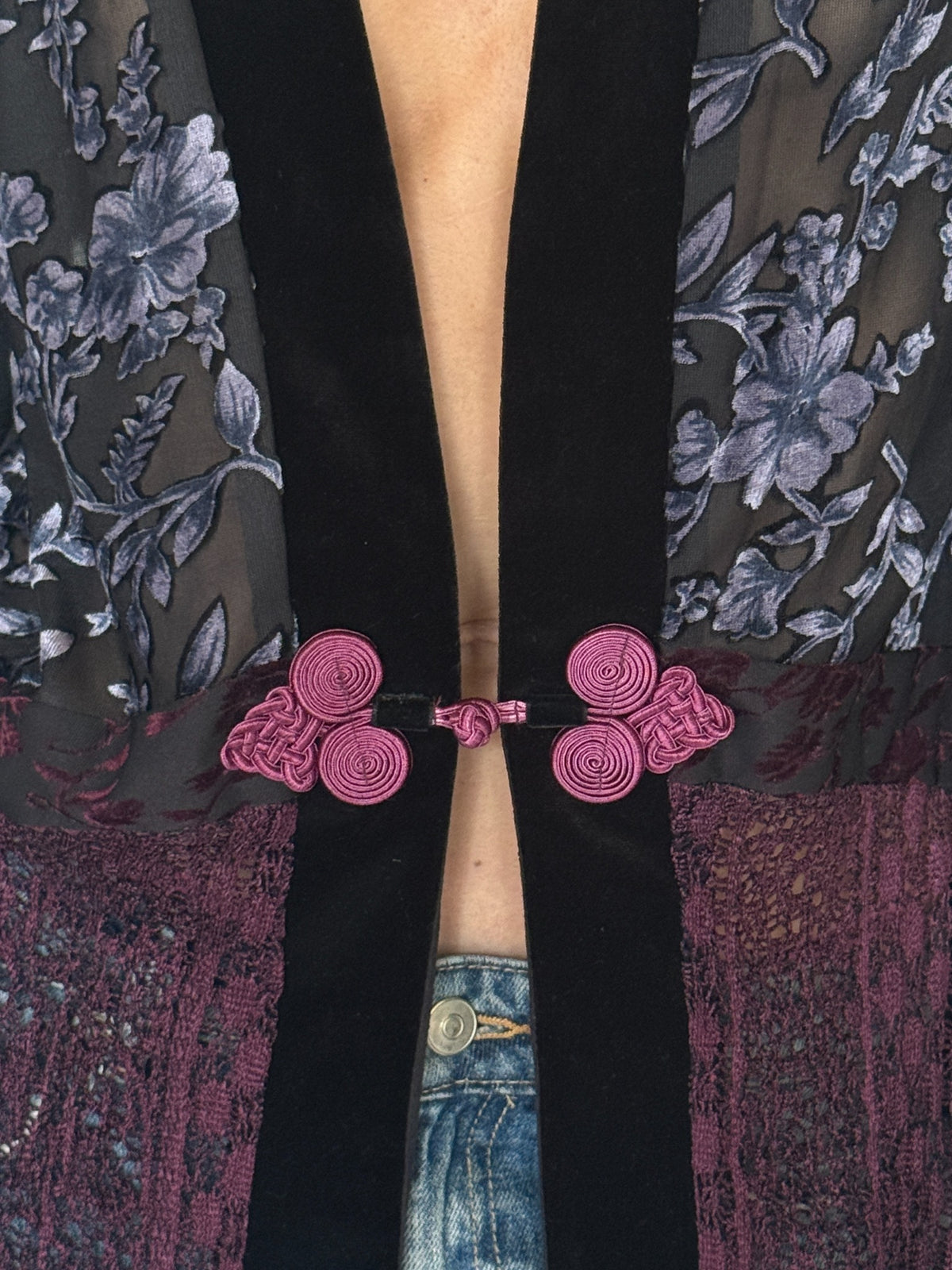 Vintage mixed-texture floral jacket frog closure detail