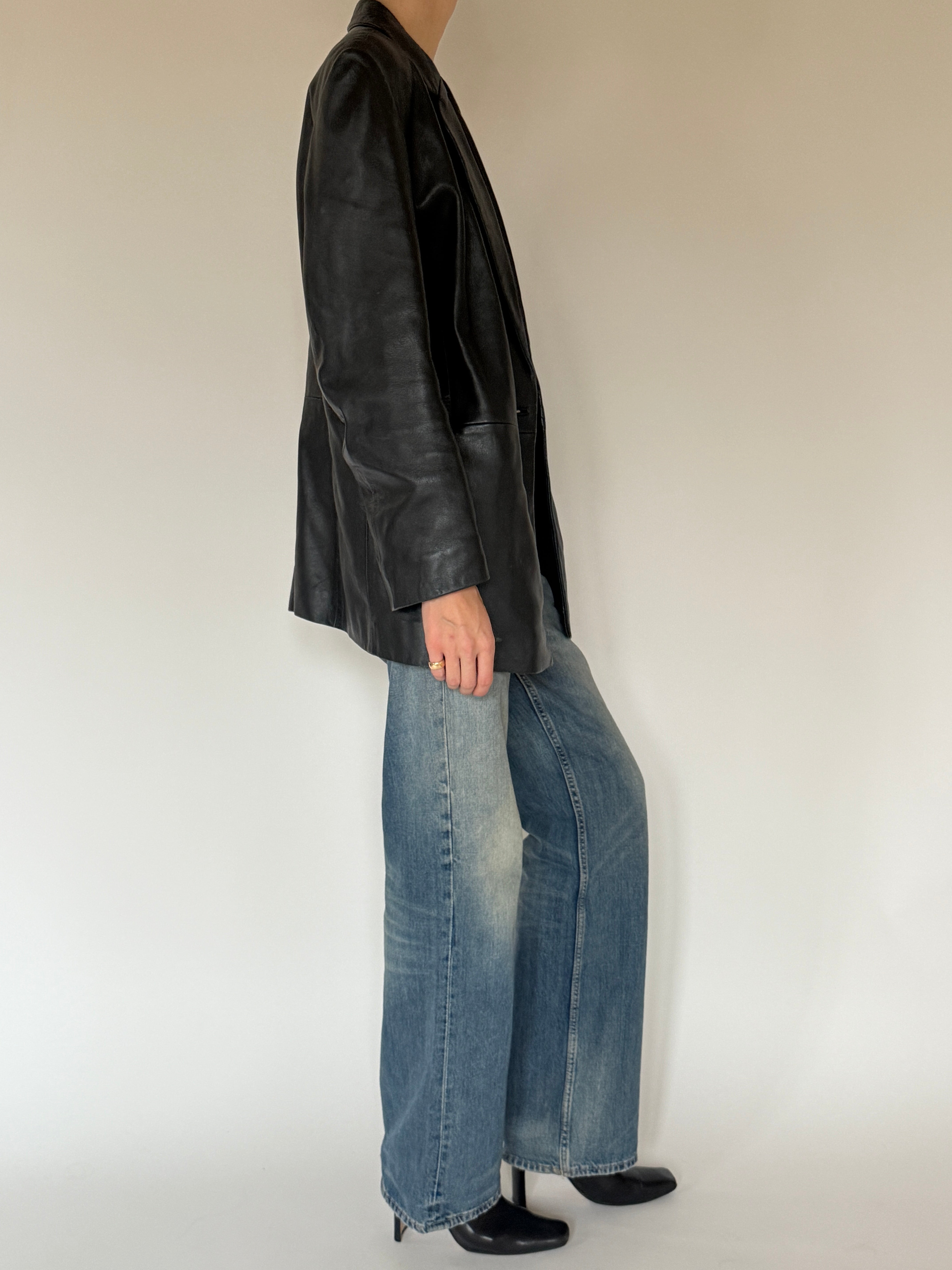 Vintage black leather blazer side view with relaxed fit