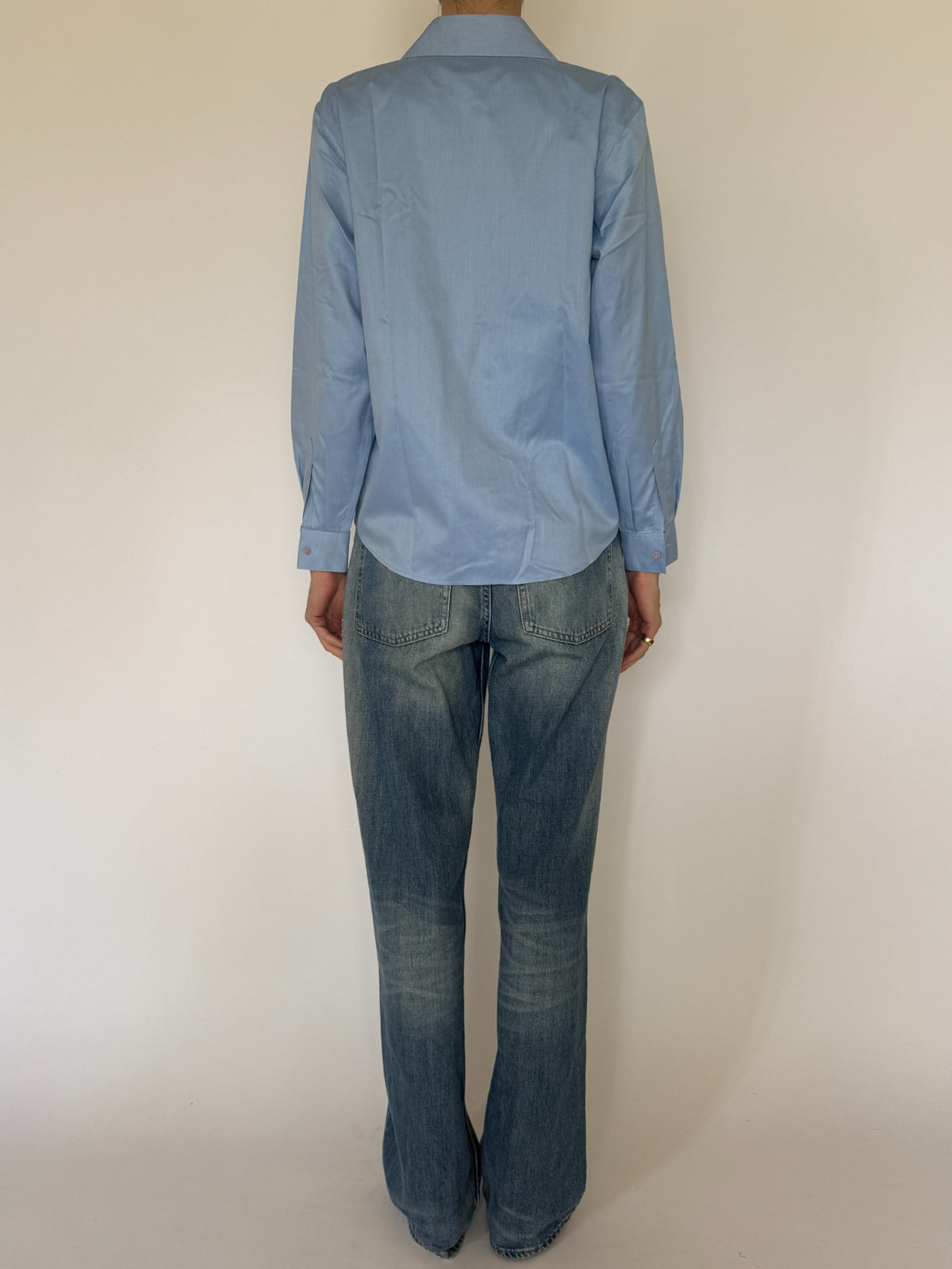 Vintage light blue button-up shirt back view