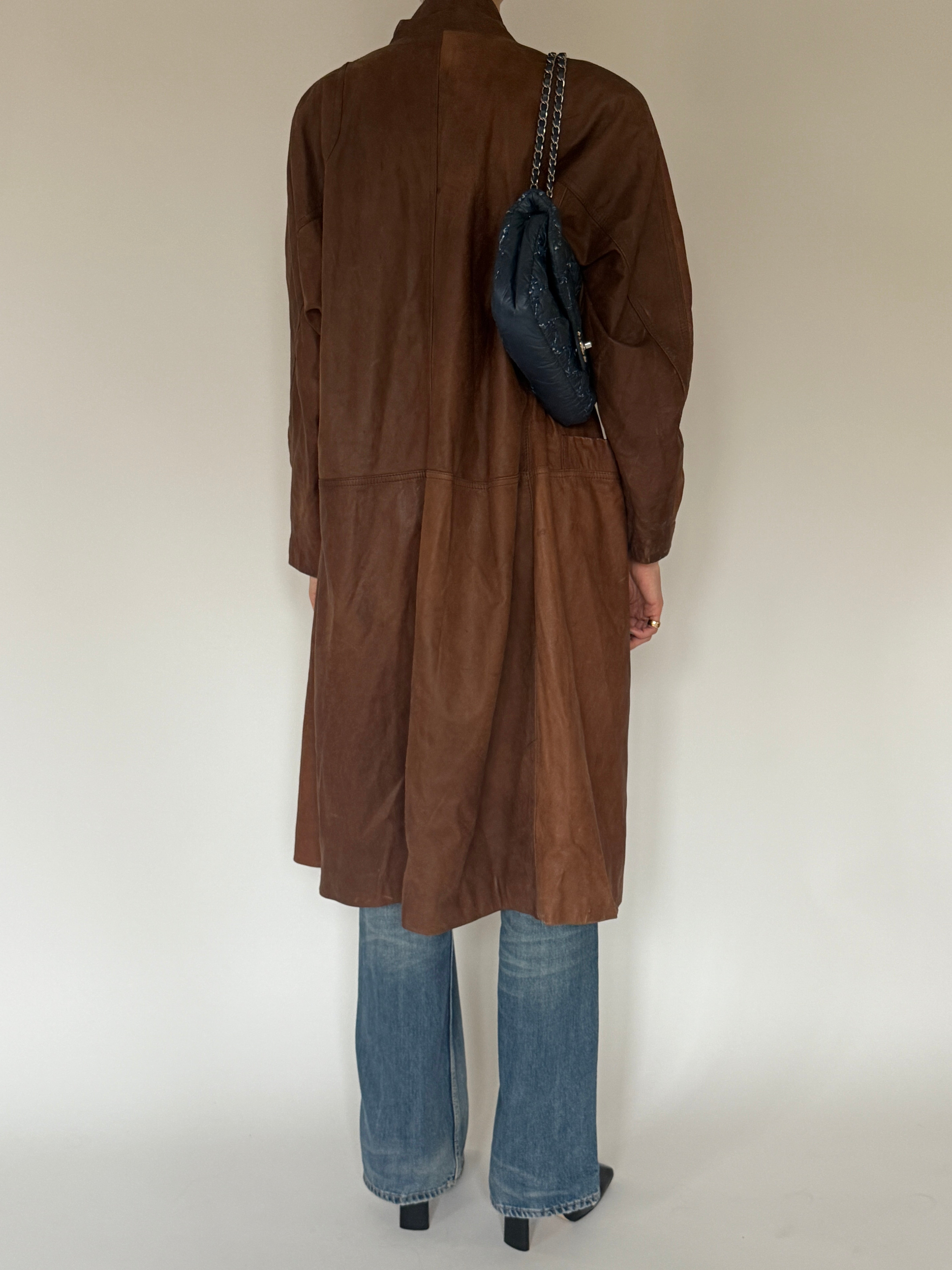 Vintage brown leather coat back view