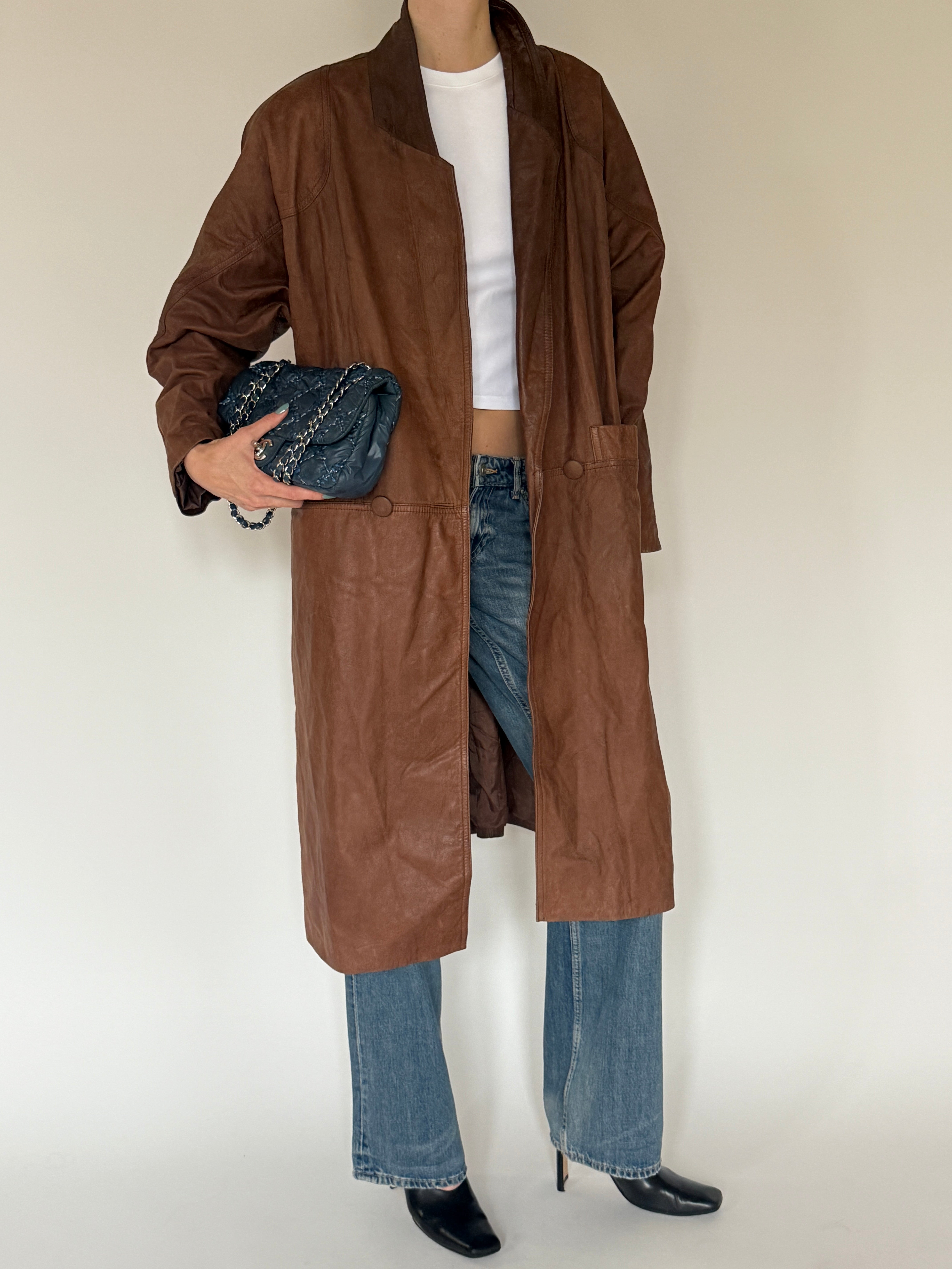 Vintage brown leather coat front view