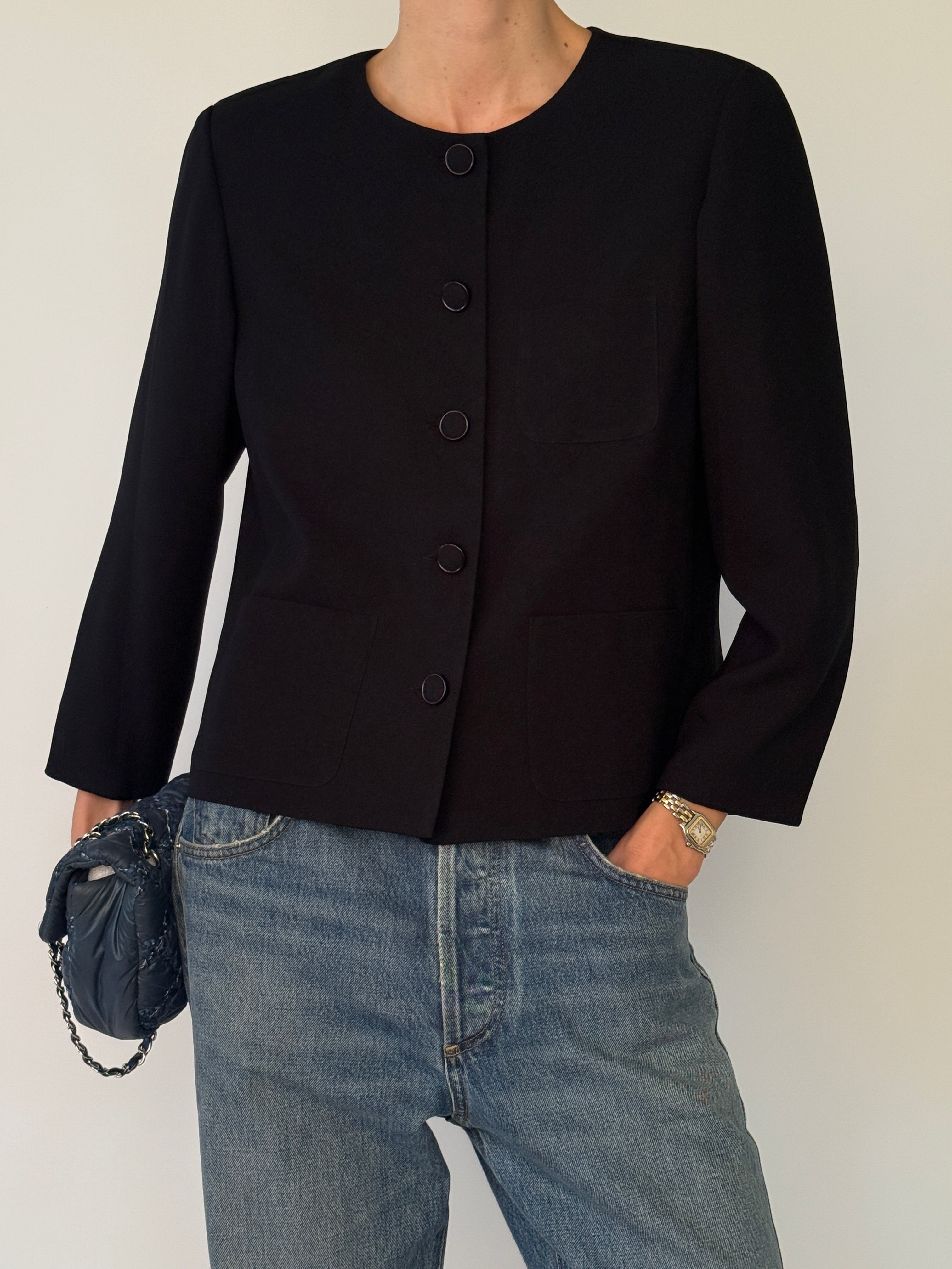 Vintage black collarless jacket patch pocket detail