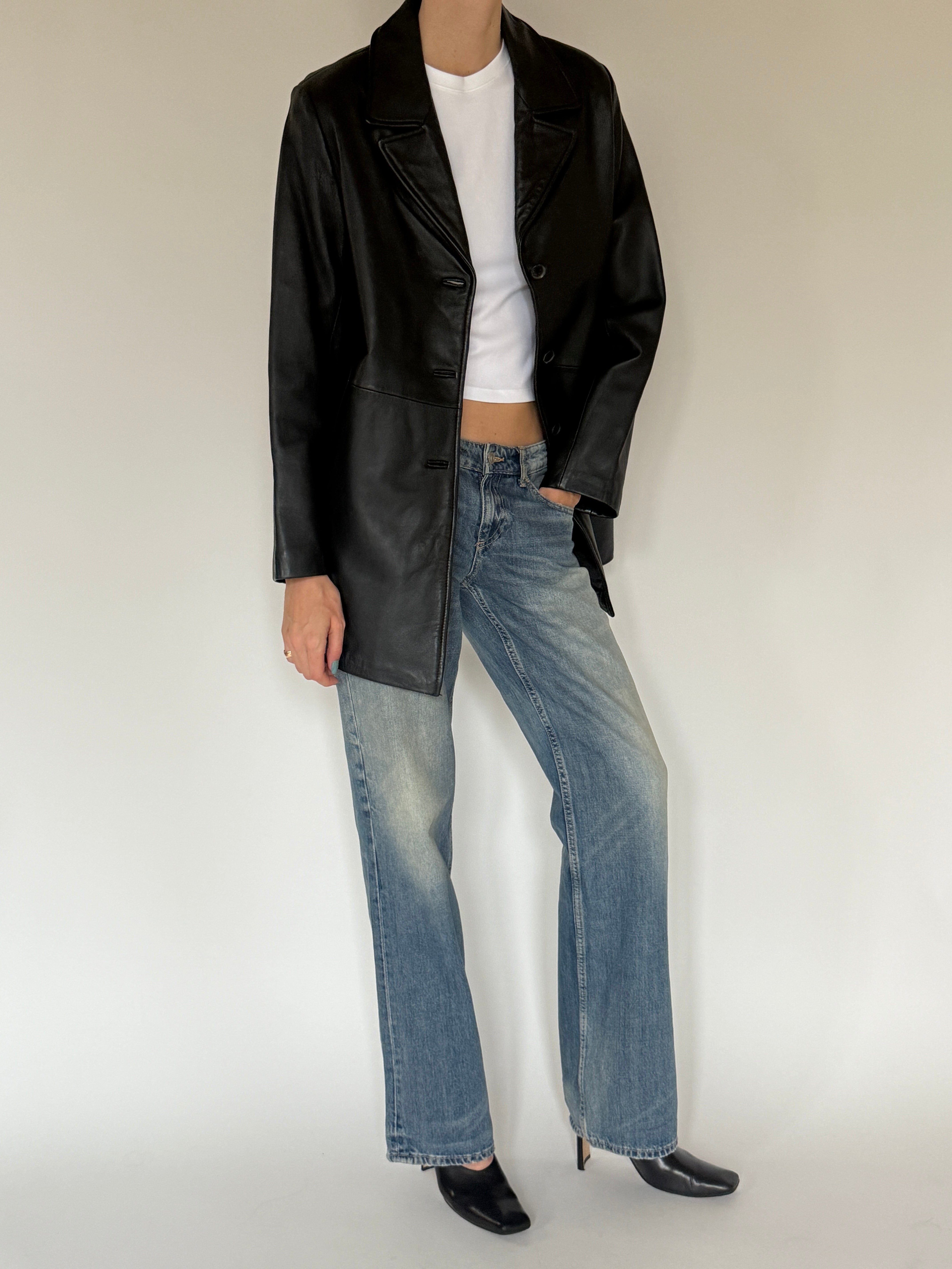 Vintage black leather blazer side angle view