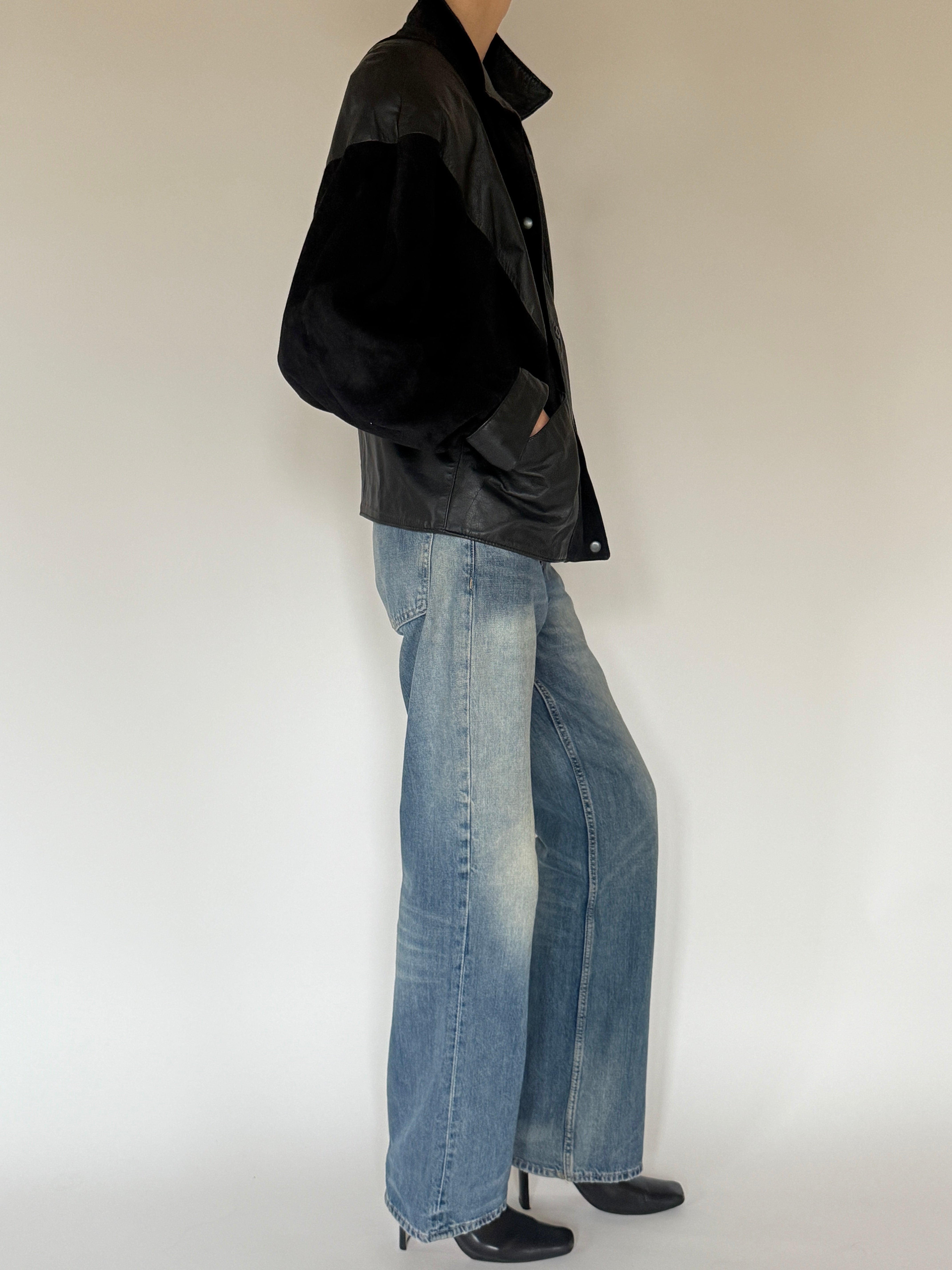 Vintage black suede and leather jacket side view