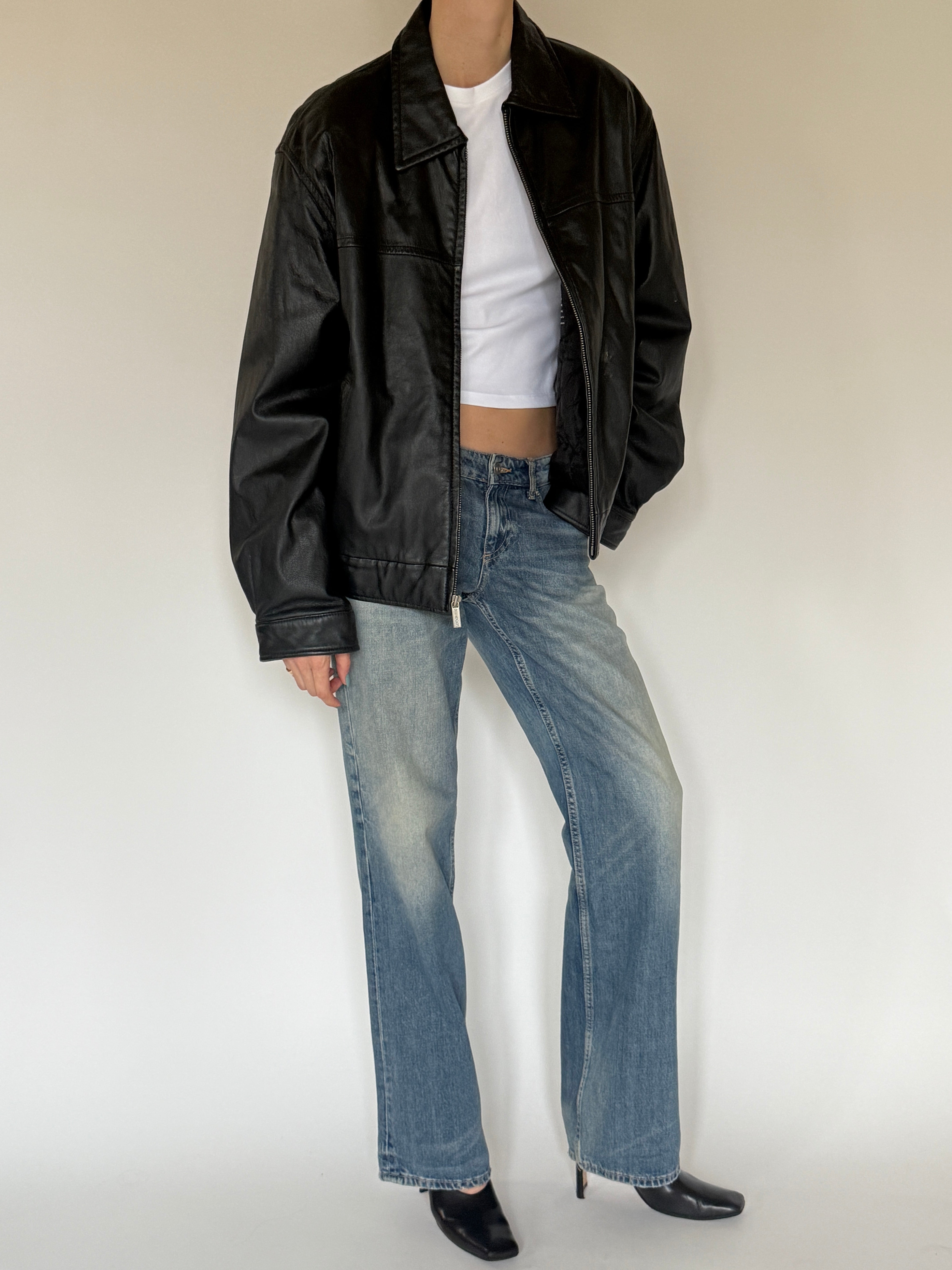 Vintage black leather jacket front view