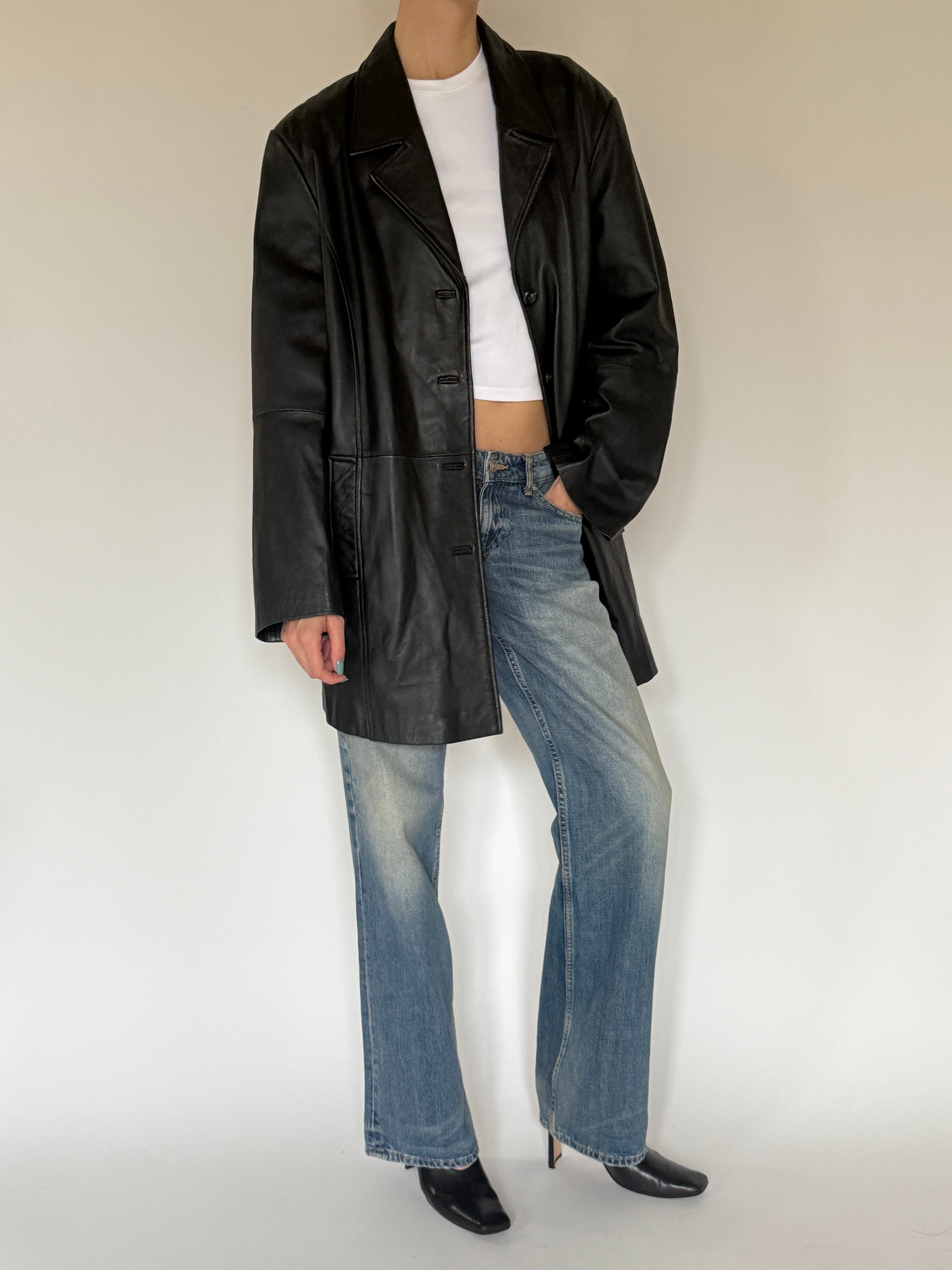 Vintage black leather jacket front view