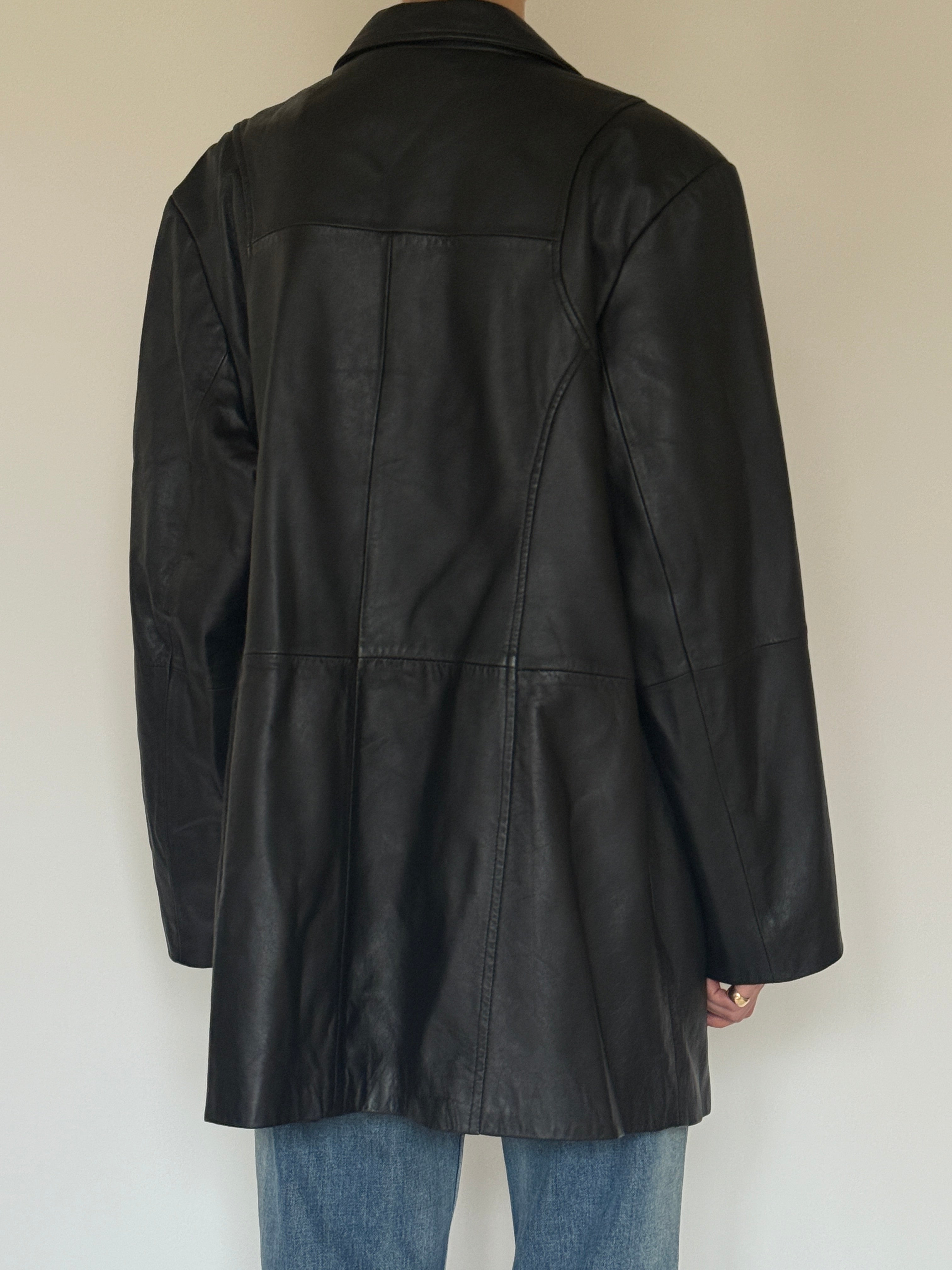 Vintage black leather jacket back view