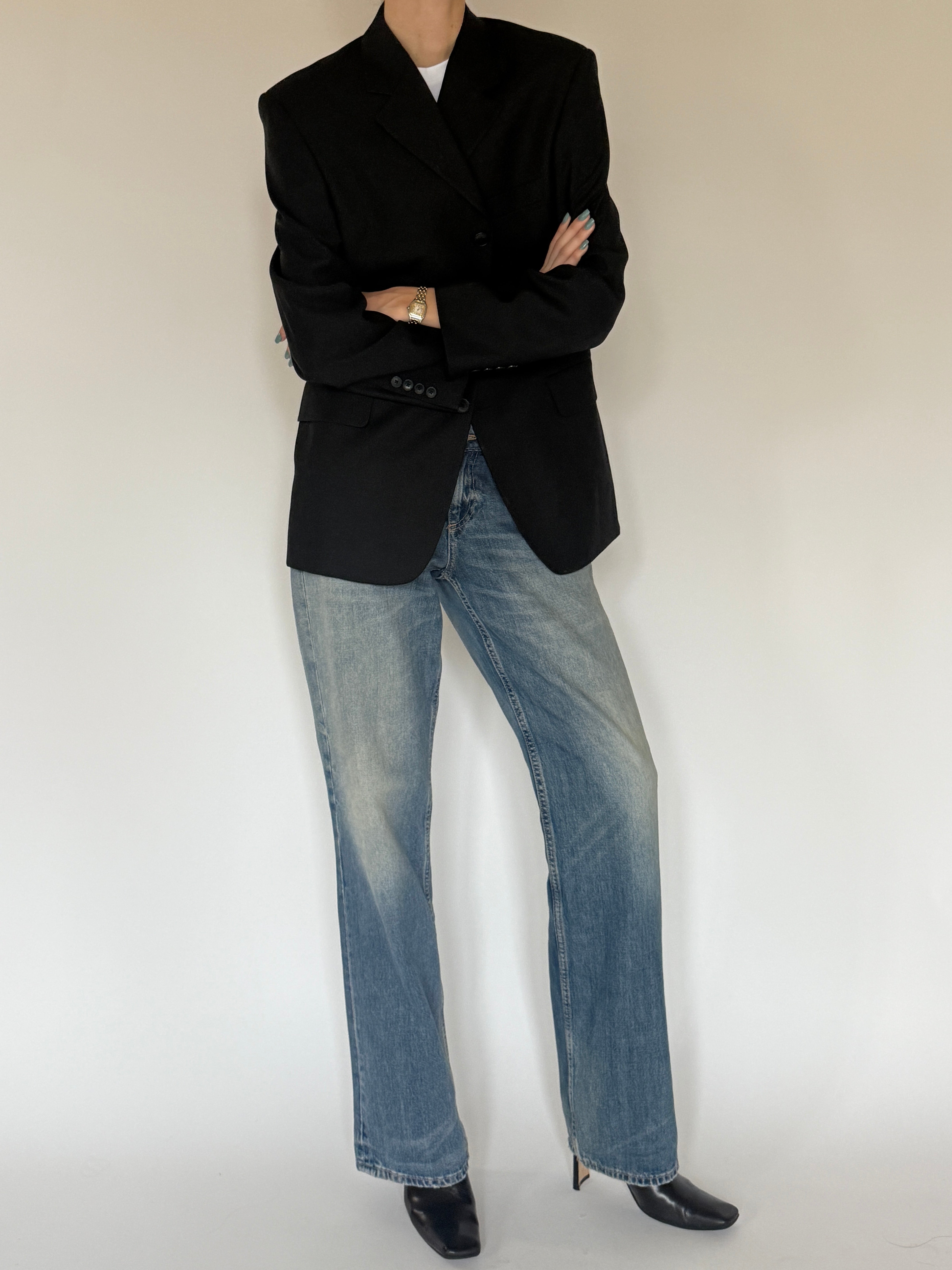 Vintage black blazer front view with tailored silhouette