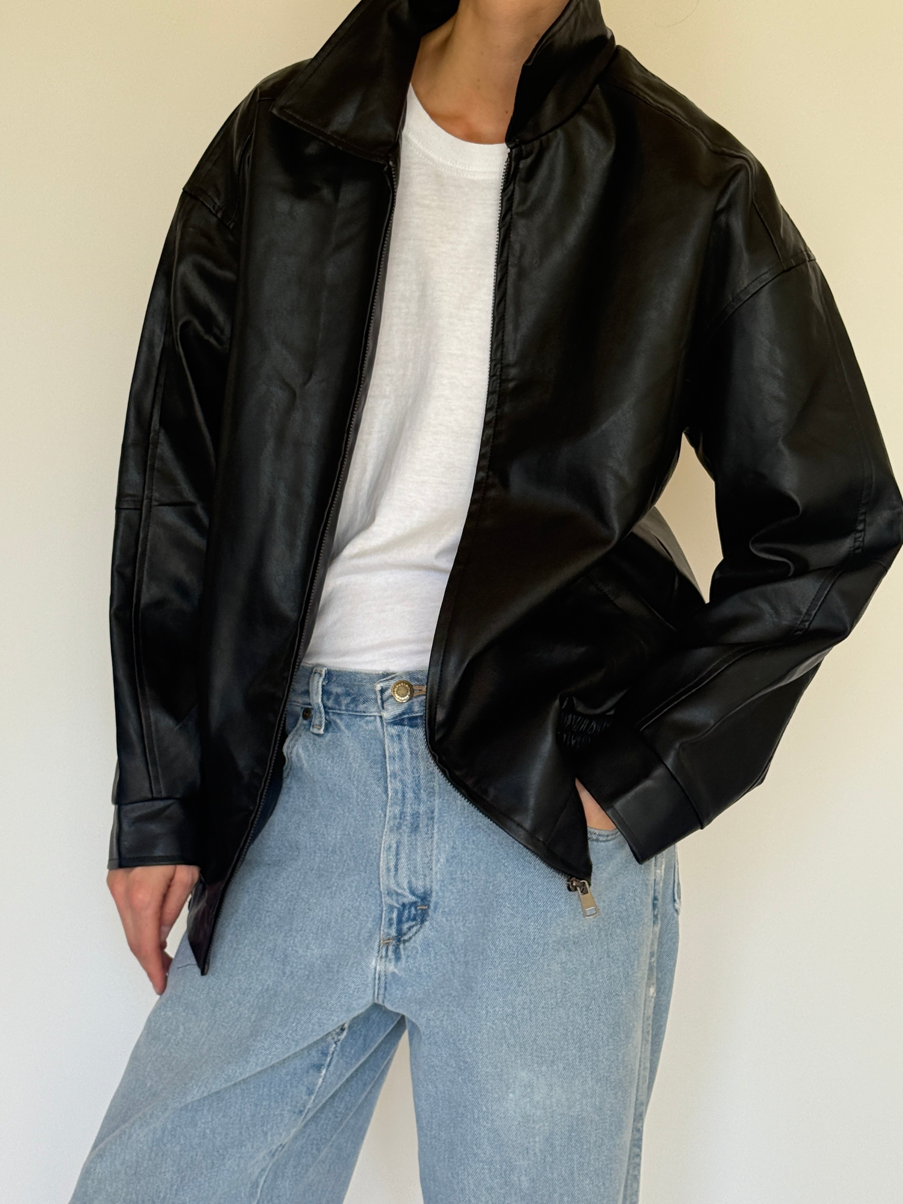 Vintage black faux leather jacket zipper detail
