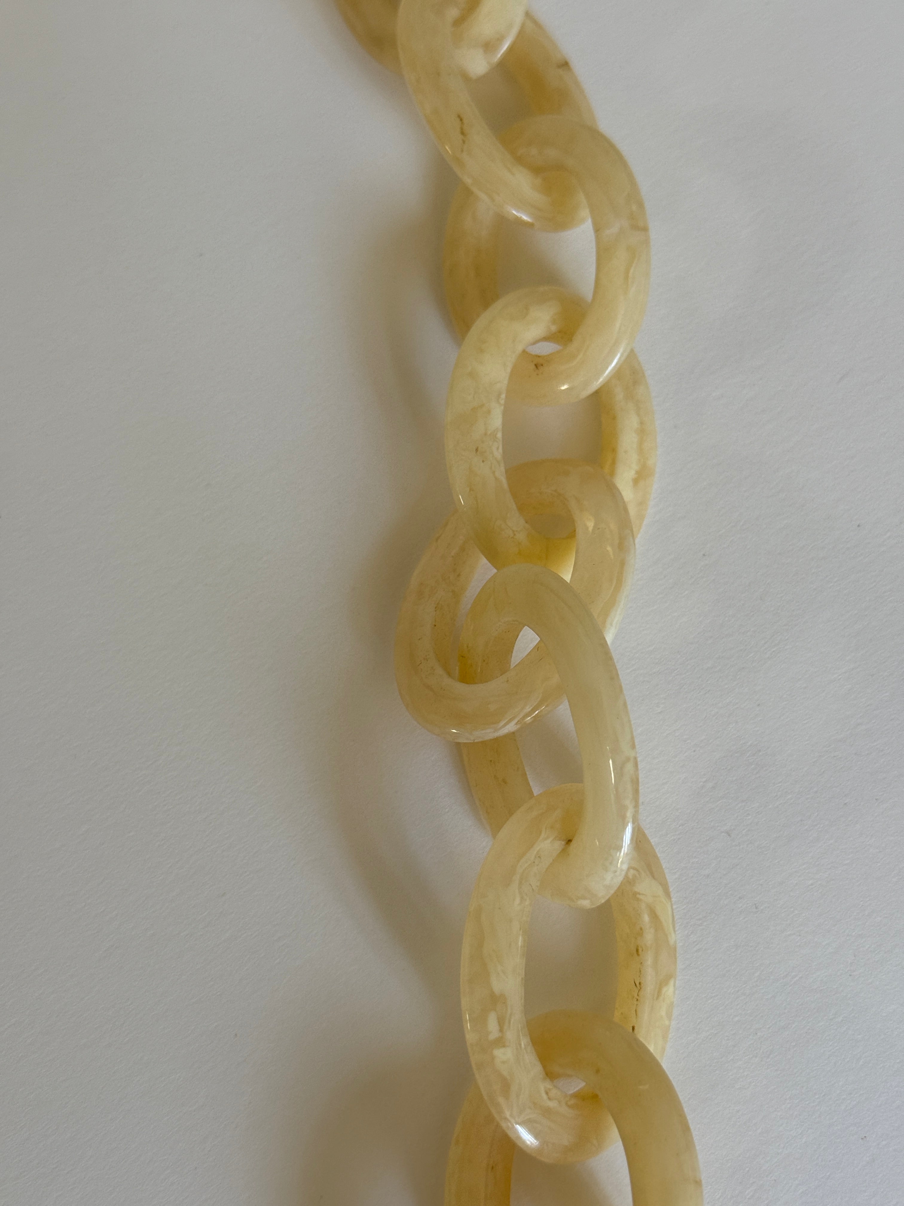 Vintage marbled resin link close-up